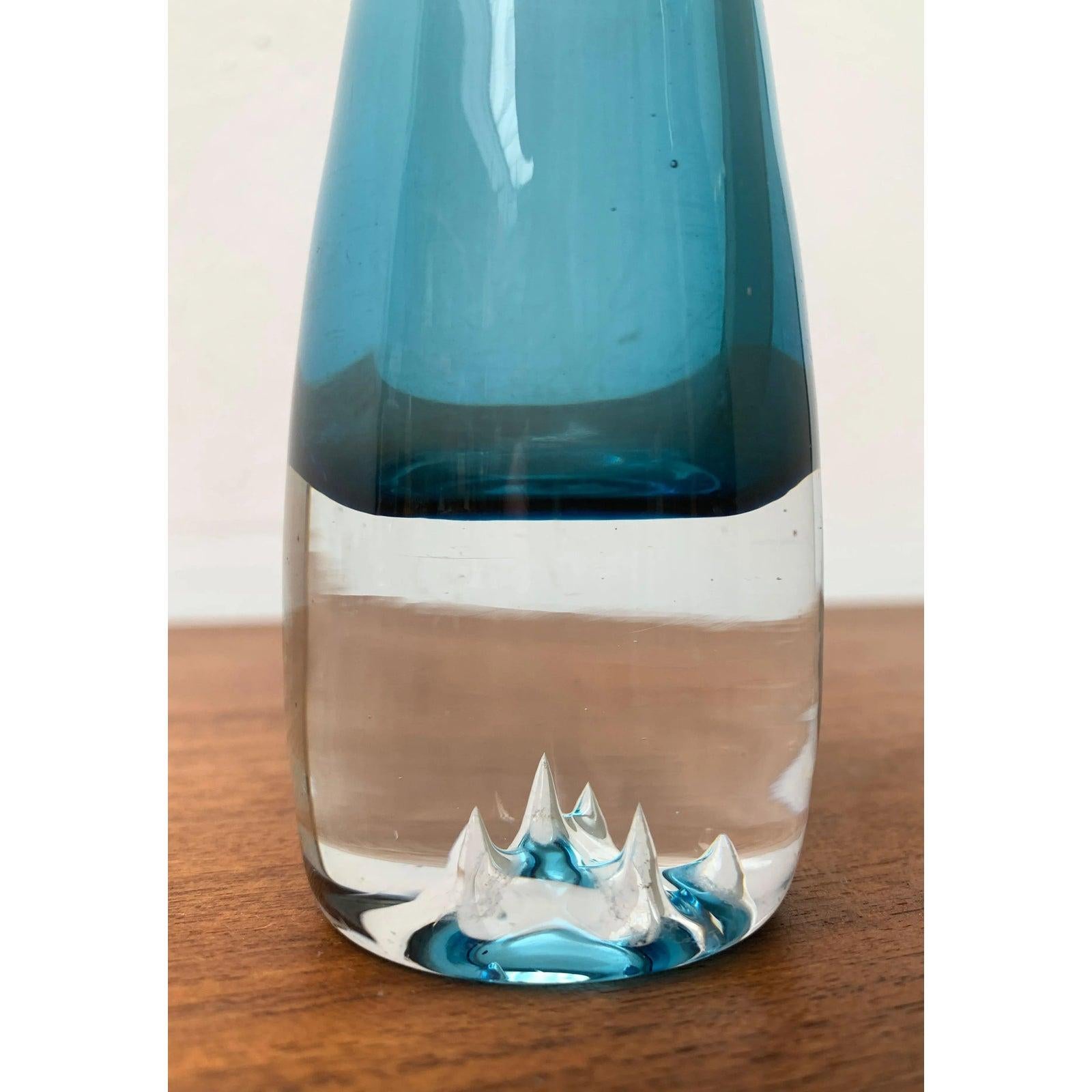 Vintage Art Glass Vase, in Very Good conditions. Designed 1970 to 1979.

Additional information:
Material: Glass
Color: Blue
Item Type: Vintage, Antique or Pre-owned
Diamension: 1.97ʺW × 1.97ʺD × 7.09ʺH
Condition: Some Imperfections
Condition Notes: