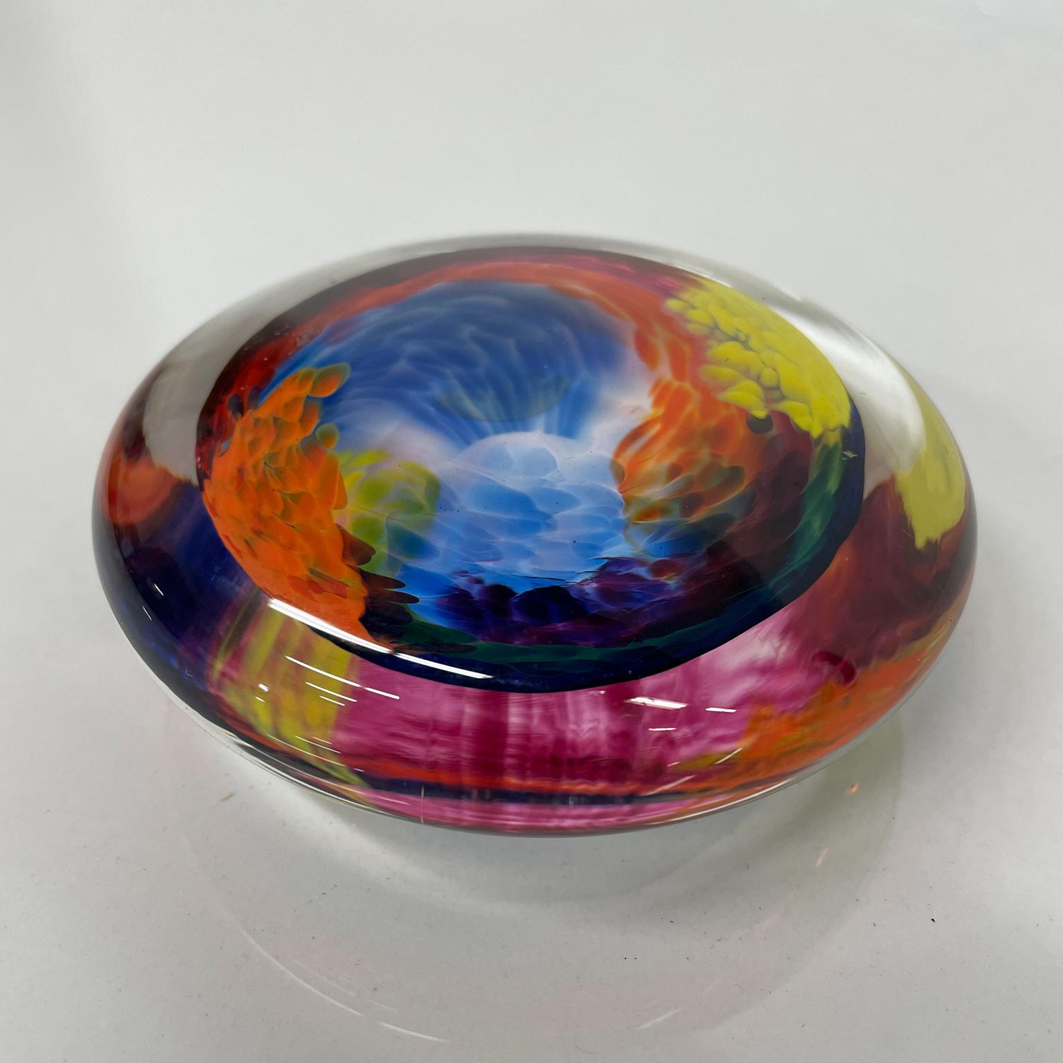 Paperweight
Vintage art glass vibrant sea of color paperweight
No signature. Style of Murano.
Measures: 3.88 diameter x 1.5
Preowned vintage original good condition. Polished flat surface at bottom.
Refer to images.
     