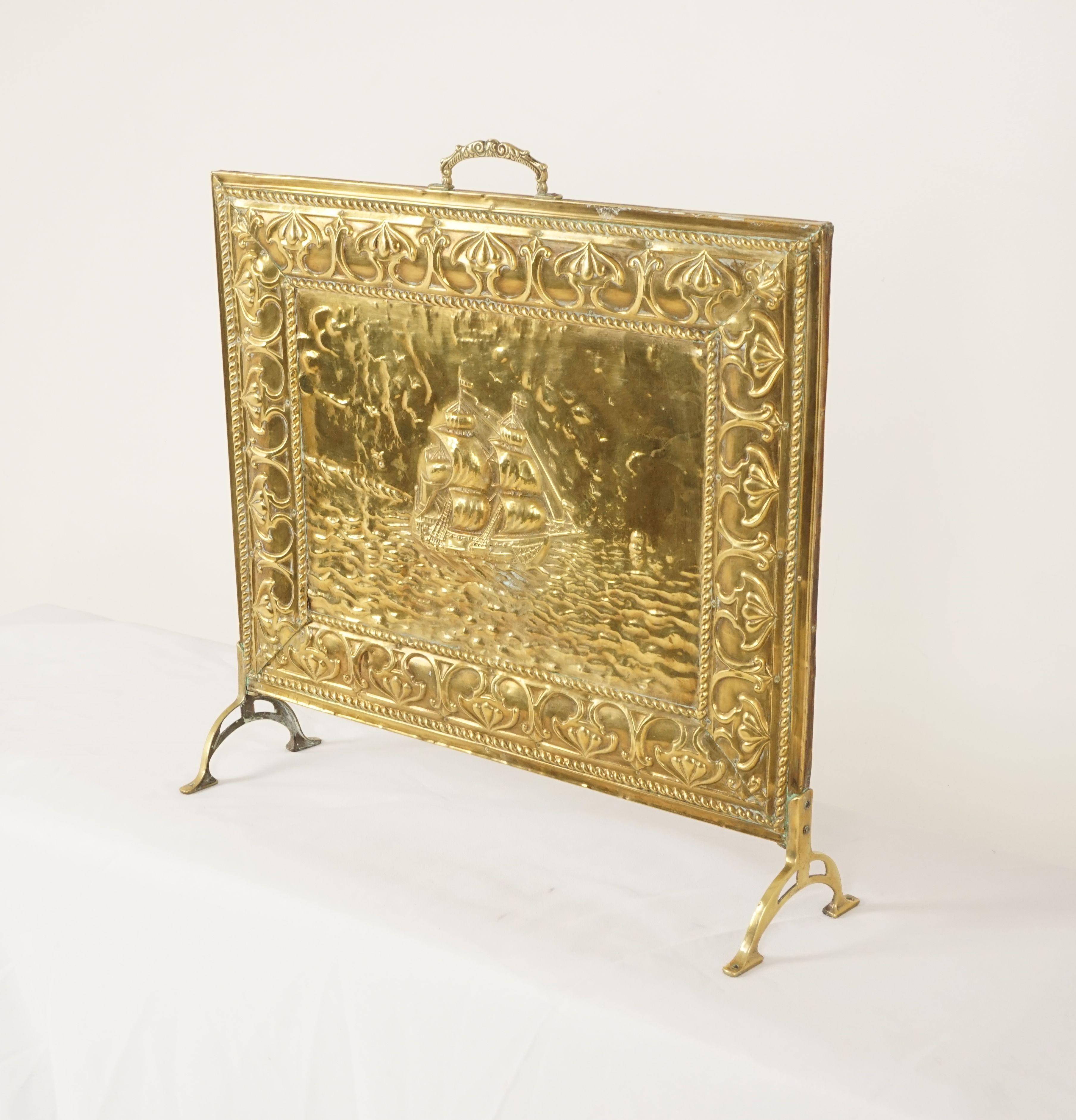 Vintage Art Nouveau fire screen, brass, Scotland 1930, B2490

Scotland, 1930
Brass handles on top
Retailing Classic Art Nouveau design elements on front
Embossed sailing ship to the center
All standing on a pair of brass