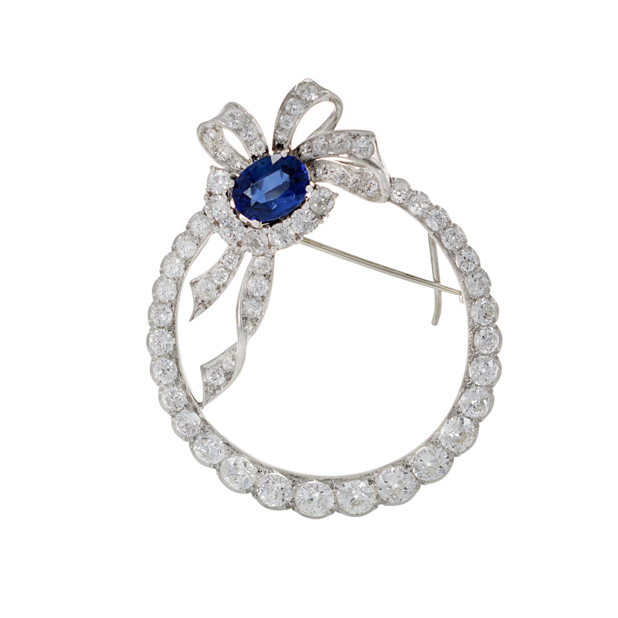 The 18KT white gold and high-quality gemstones make for a stunning, timeless piece that showcases the intricate beauty of the Art Nouveau era. This brooch boasts a large 2.00CT Ceylon blue sapphire and 3.00CT-TW F-VS old European cut diamonds,
