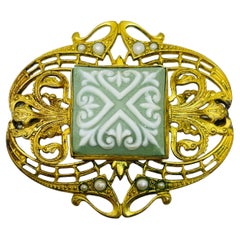 Vintage Art Nouveau gold tone brass green glass brooch