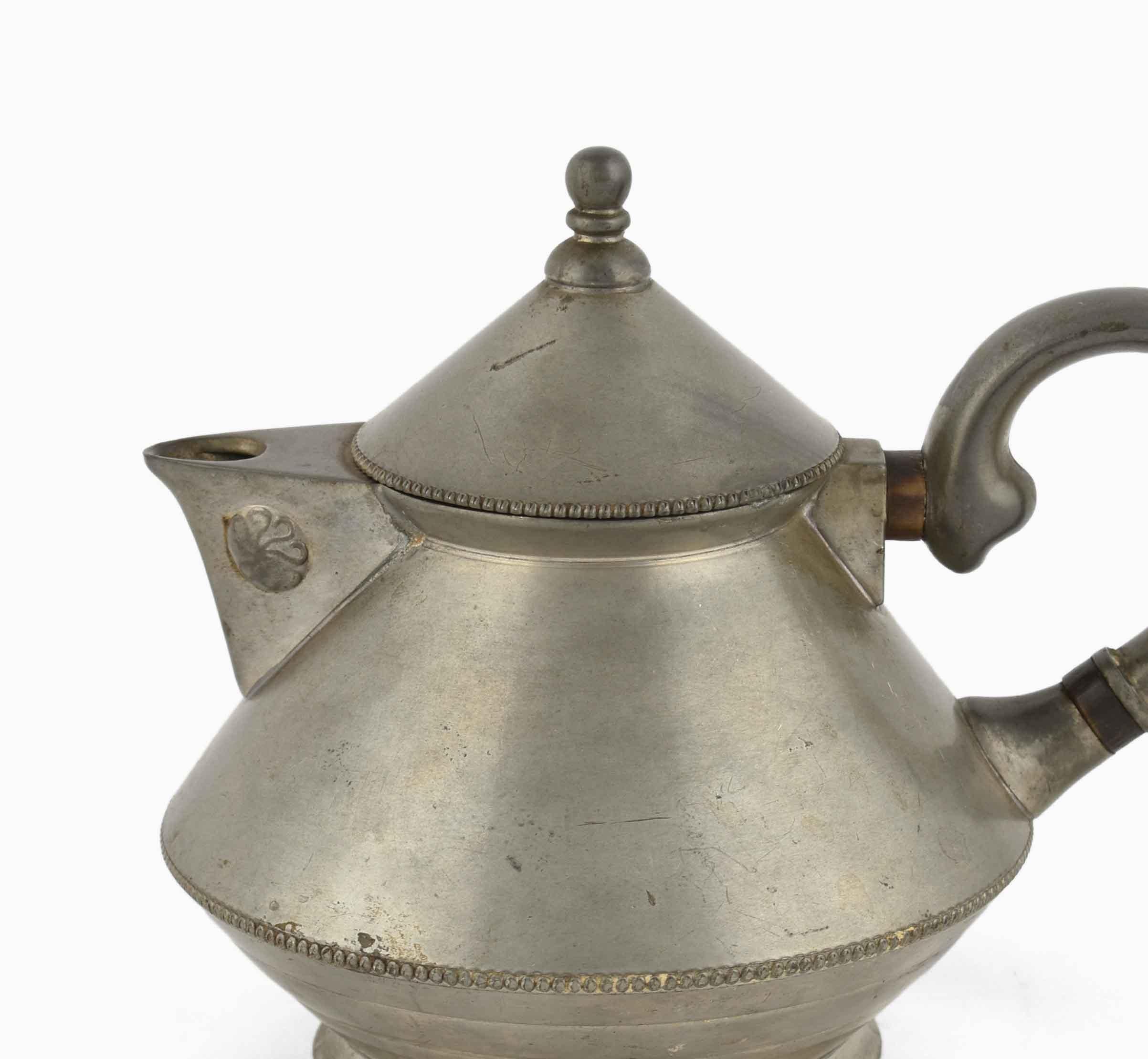 Art Nouveau pot is an original decorative object realized in 1905.

Original pewter.

Produced by Gerhardi & Co., Lüdenscheid. Designed by Paul Haustein, model no. 1829.

Very good conditions.

Beautiful and elegant pewter pot with a