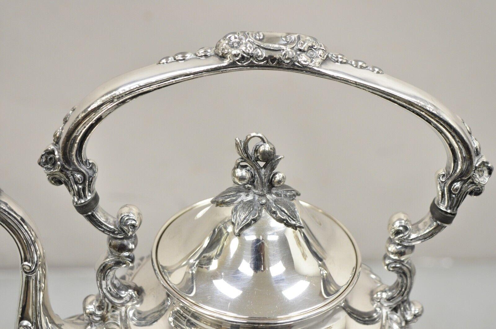 Vintage Art Nouveau Silver Plated Floral Repousse Tilting Tea Pot on Stand For Sale 3