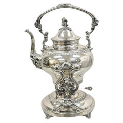 Vintage Art of Vintage Silver Plated Floral Repousse Tilting Tea Pot on Stand