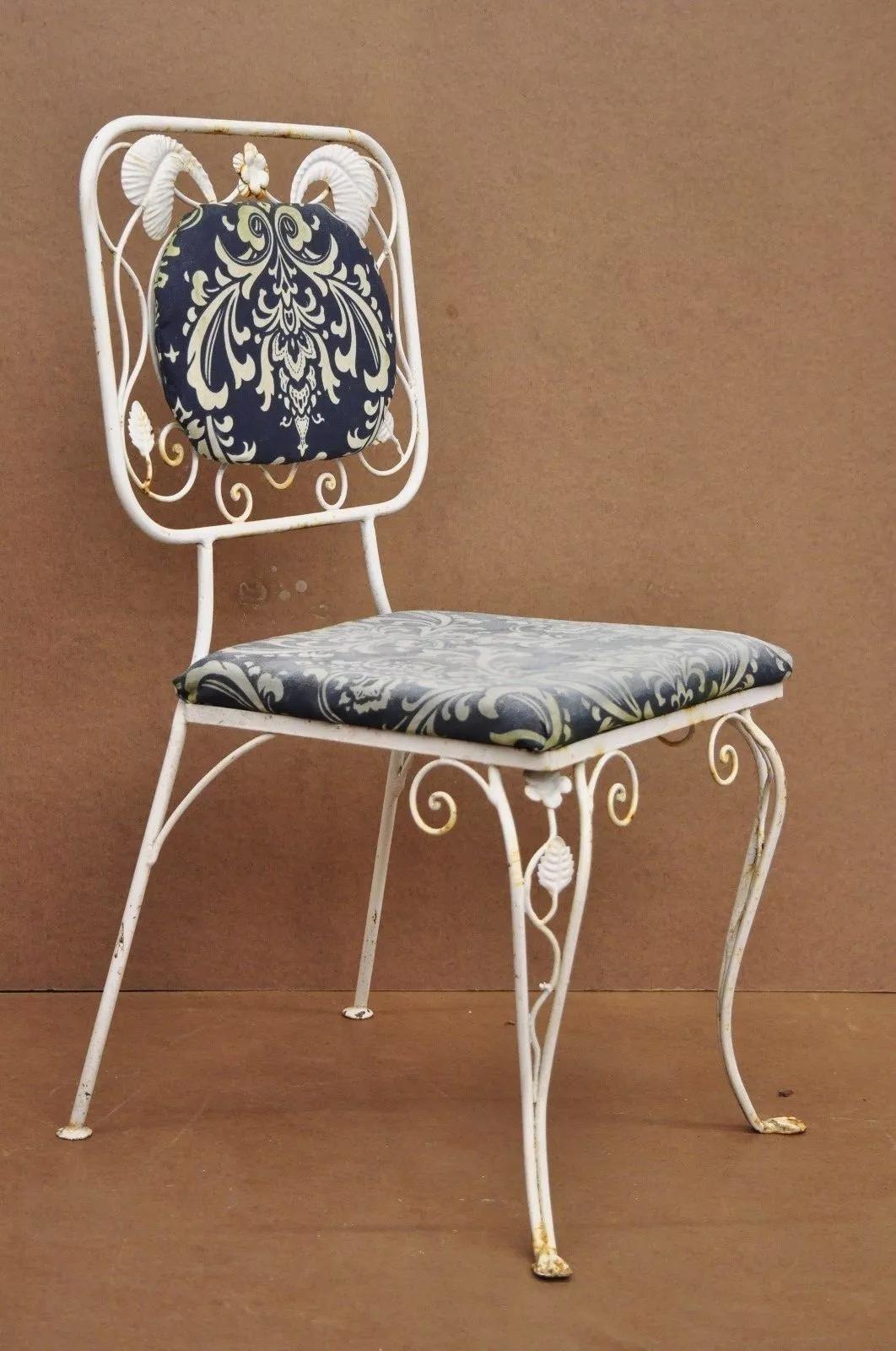 Vintage French Art Nouveau Style Floral Wrought Iron Garden Dining Chairs - Set of 4. Item features floral and leafy accents, wrought iron construction, upholstered seat and back, great style and form. Circa Mid 20th Century. Measurements: 35