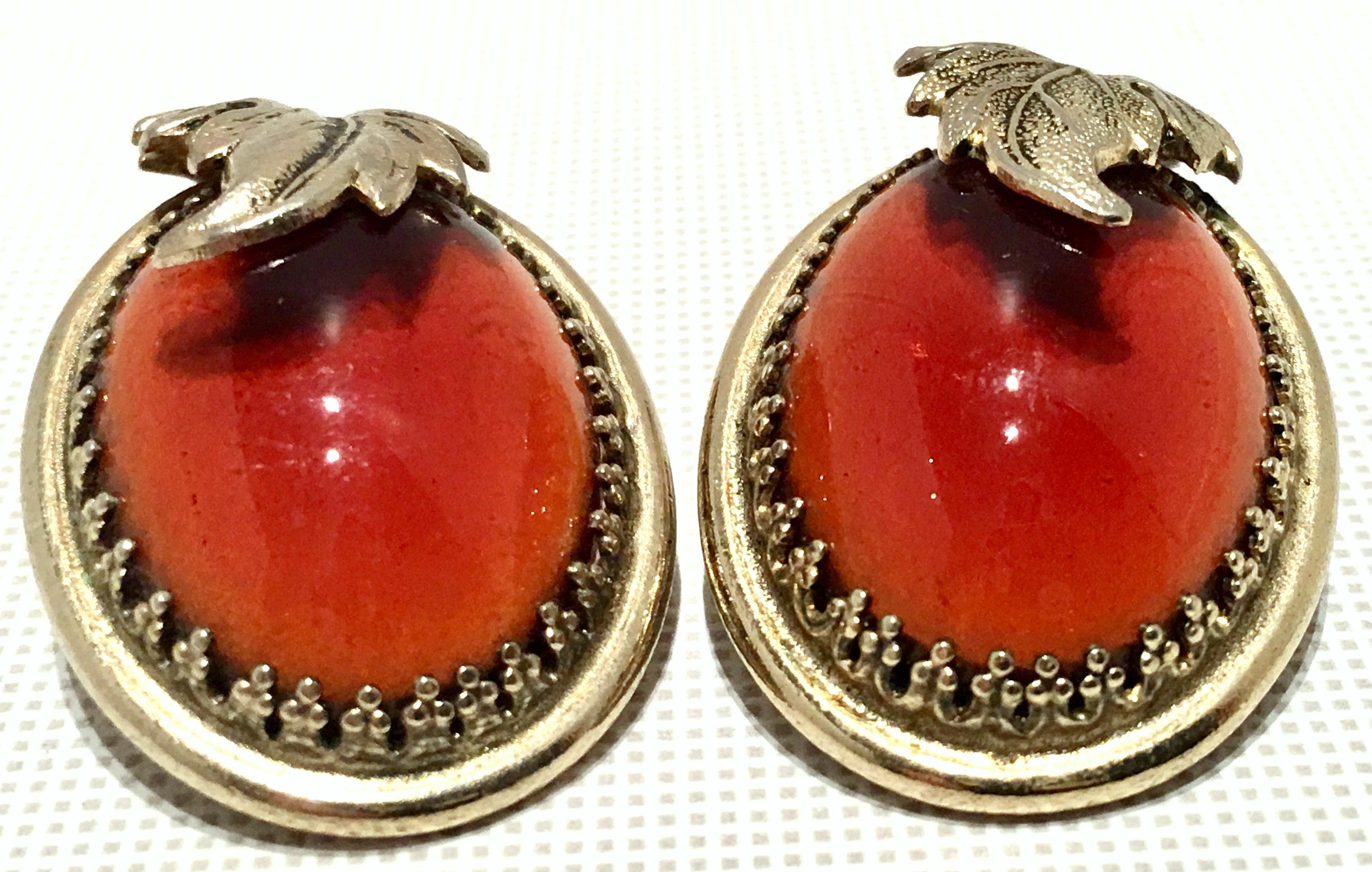 Art Nouveau Style Whiting & Davis amber art glass stone set in antiqued gold plate with leaf detail clip style earrings, signed.
