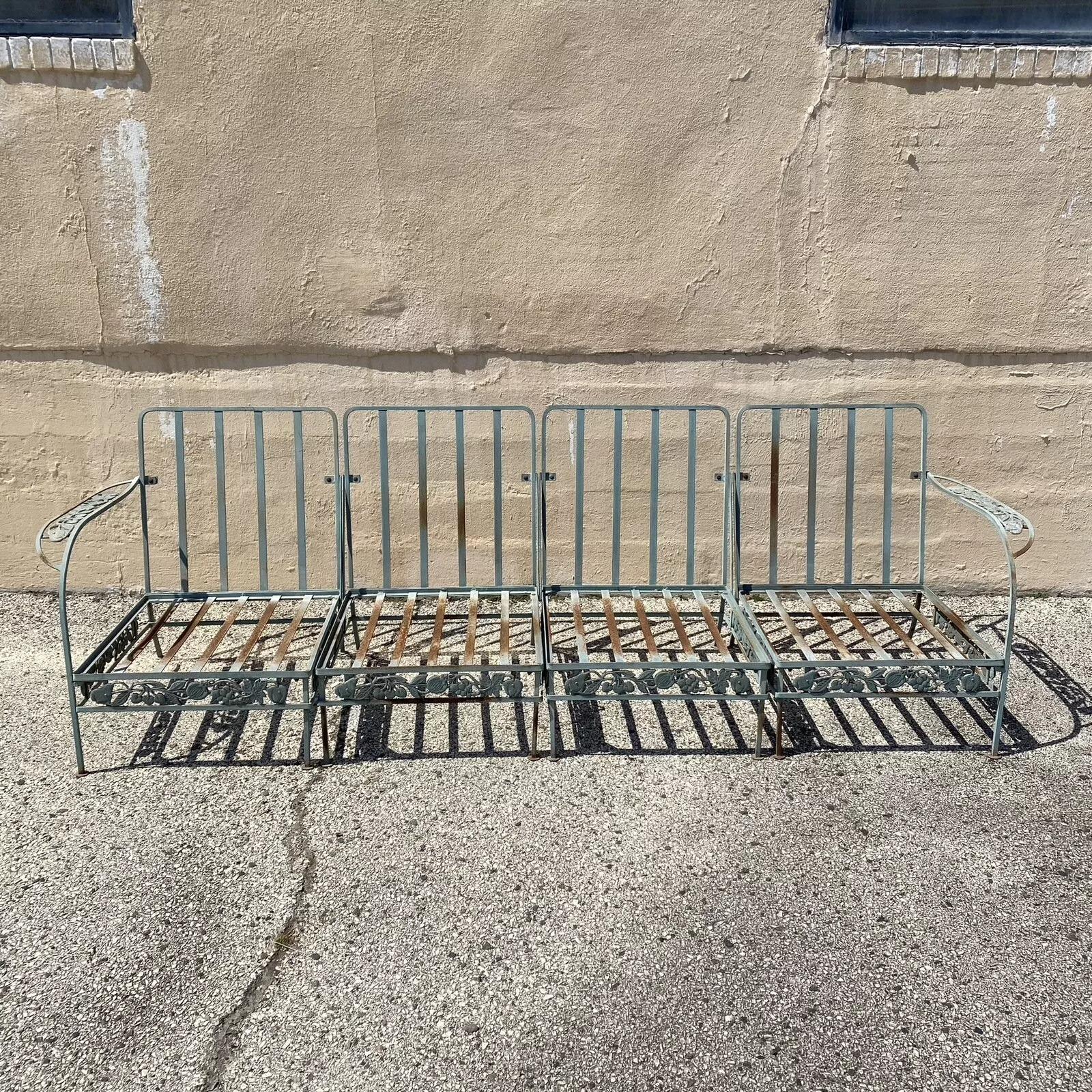 Vintage Art Nouveau Wrought Iron Woodard Style Garden Patio Sofa Chair Set - 4 Pcs. Set can be arranged in various positions. Frames feature harvest and fruit detail throughout. Circa Mid 20th Century. Measurements: 32