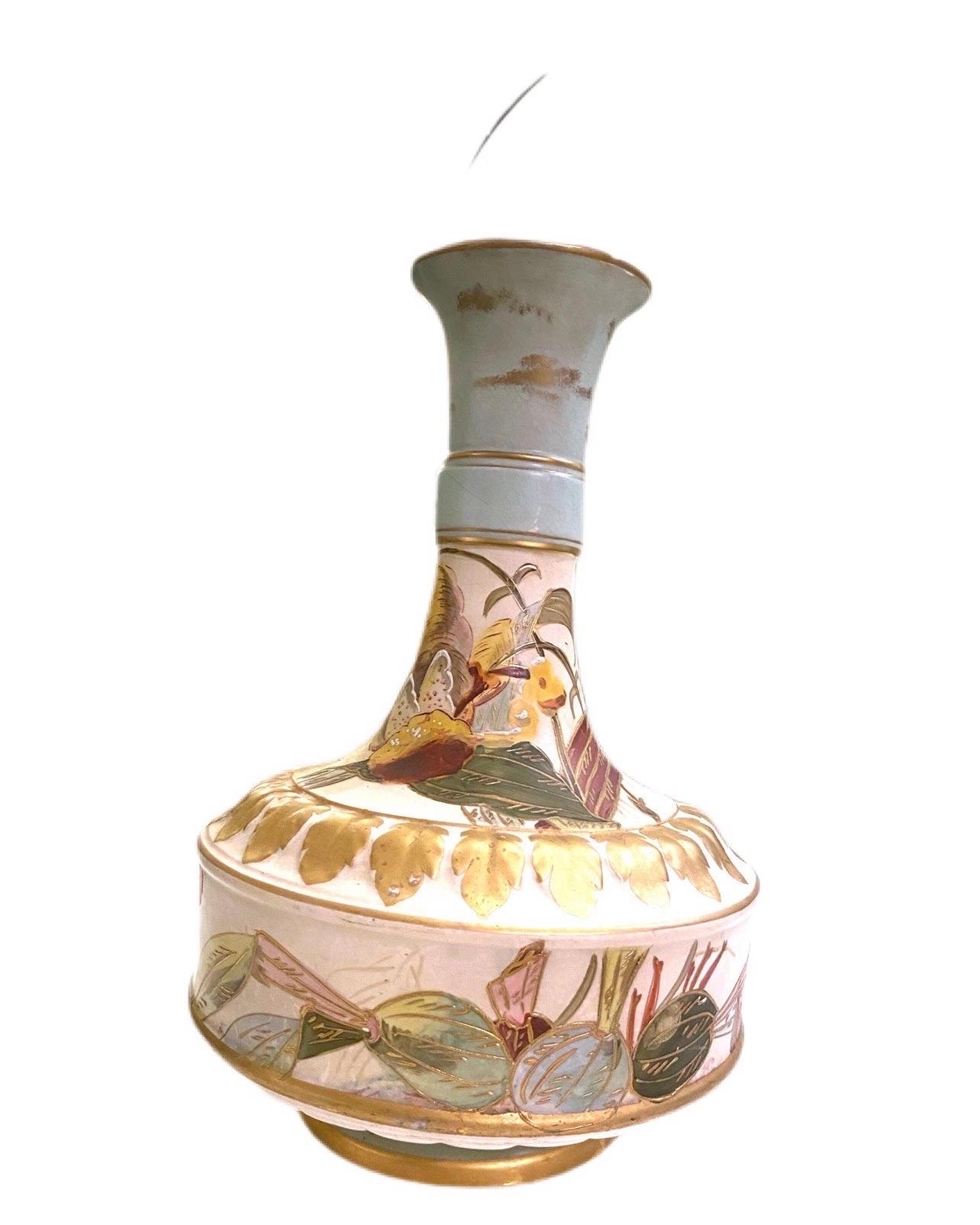 This beautiful vase is actually pretty big, with a large body and a tall slim neck. Hand painted with gold leaf details throughout. Words I thought I would never say... gorgeous onions painted around the lower base. Flowers surround the neck snd a