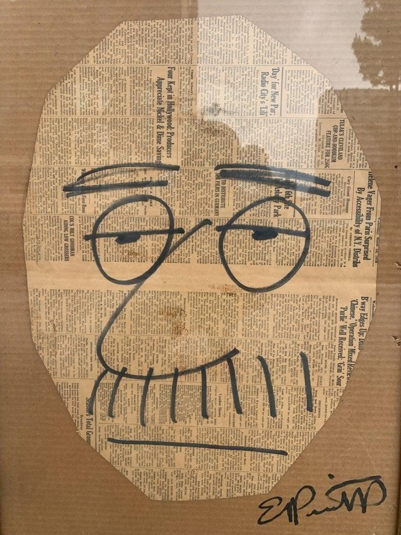 Vintage art done on a cutout of a 1970 newspaper, made to resemble a head with cartoonish eyes, nose and mustache painted on the back of the glass, the paper is dated Wednesday, March 18, 1970. The piece is signed by Ernest Pintoff.

The piece is