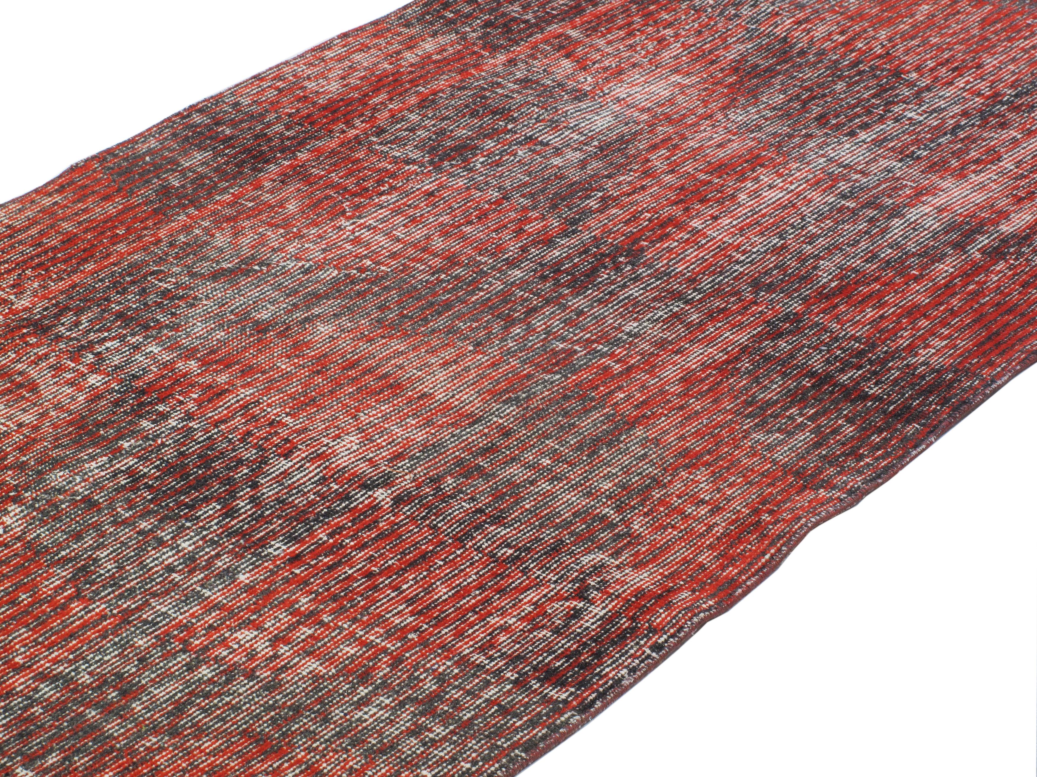 Vintage Turkish Art Deco Runner Rug

Discover a one-of-a-kind vintage Turkish Art Deco runner rug, hand-knotted with exquisite craftsmanship and approximately 50 years old. This minimalist yet elegant rug features a sophisticated palette of rust and