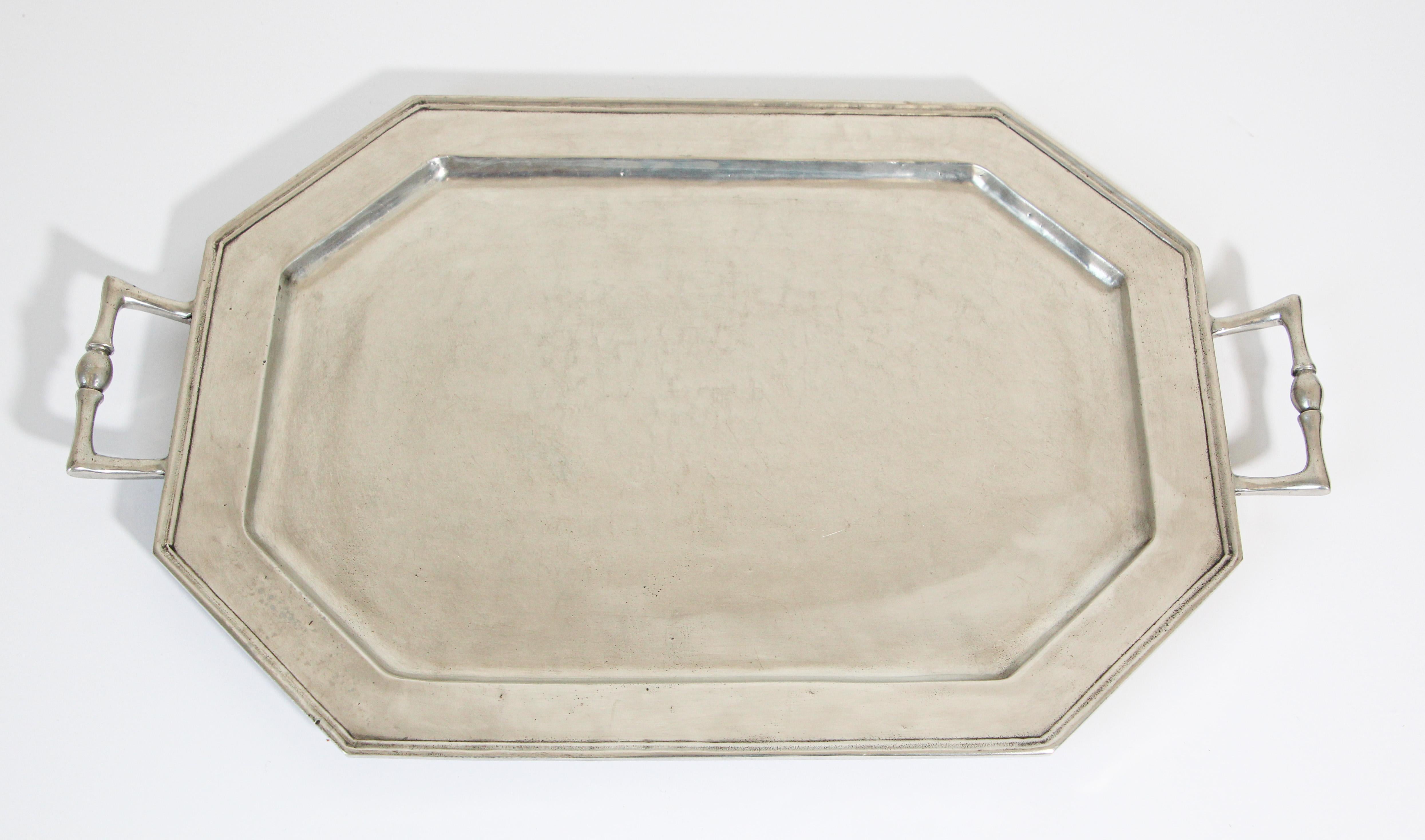 Large Vintage style Arte Italica Peltro Octagonal serving Tray with handles.
Serve in style with this stunning pewter tray. 
The Arte Italica Peltro features a classic shape and old world feel.
This pewter tray utilizes centuries-old technique