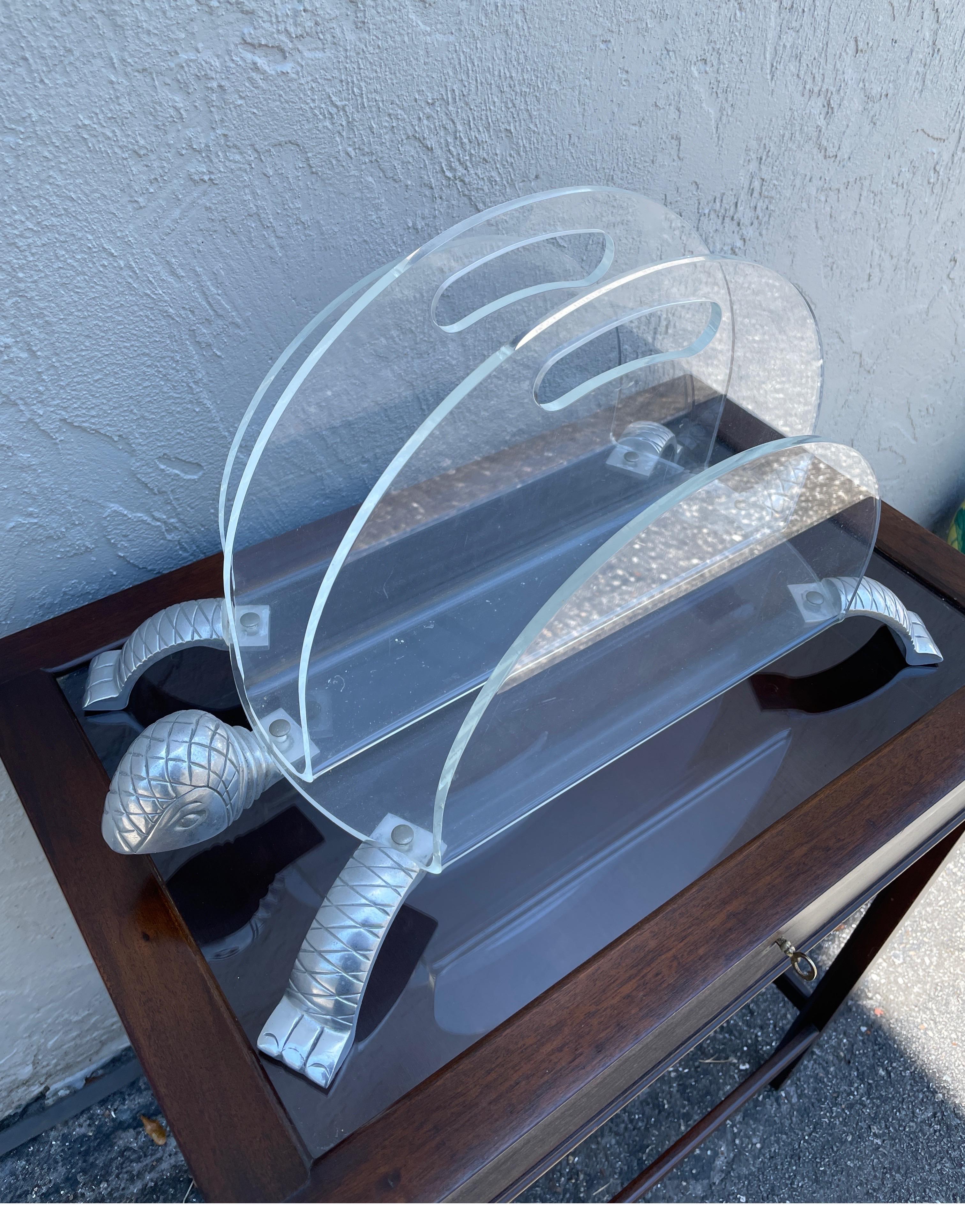 Whimsical acrylic and aluminum Turtle magazine holder by Arthur Court.
In very nice condition.