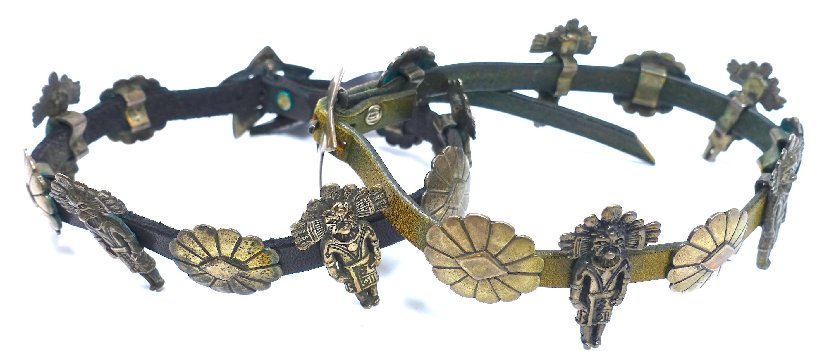 These rare vintage boot jewelry by Arthur Goldstein feature American Indian images in sterling silver. One strap is black leather and the other is a peridot green.  In excellent condition, each strap measures 20” x 1-1/2” and bears the “Arthur