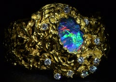 Vintage Arthur King Bracelet Featuring Opal and Diamond Hidden Wristwatch