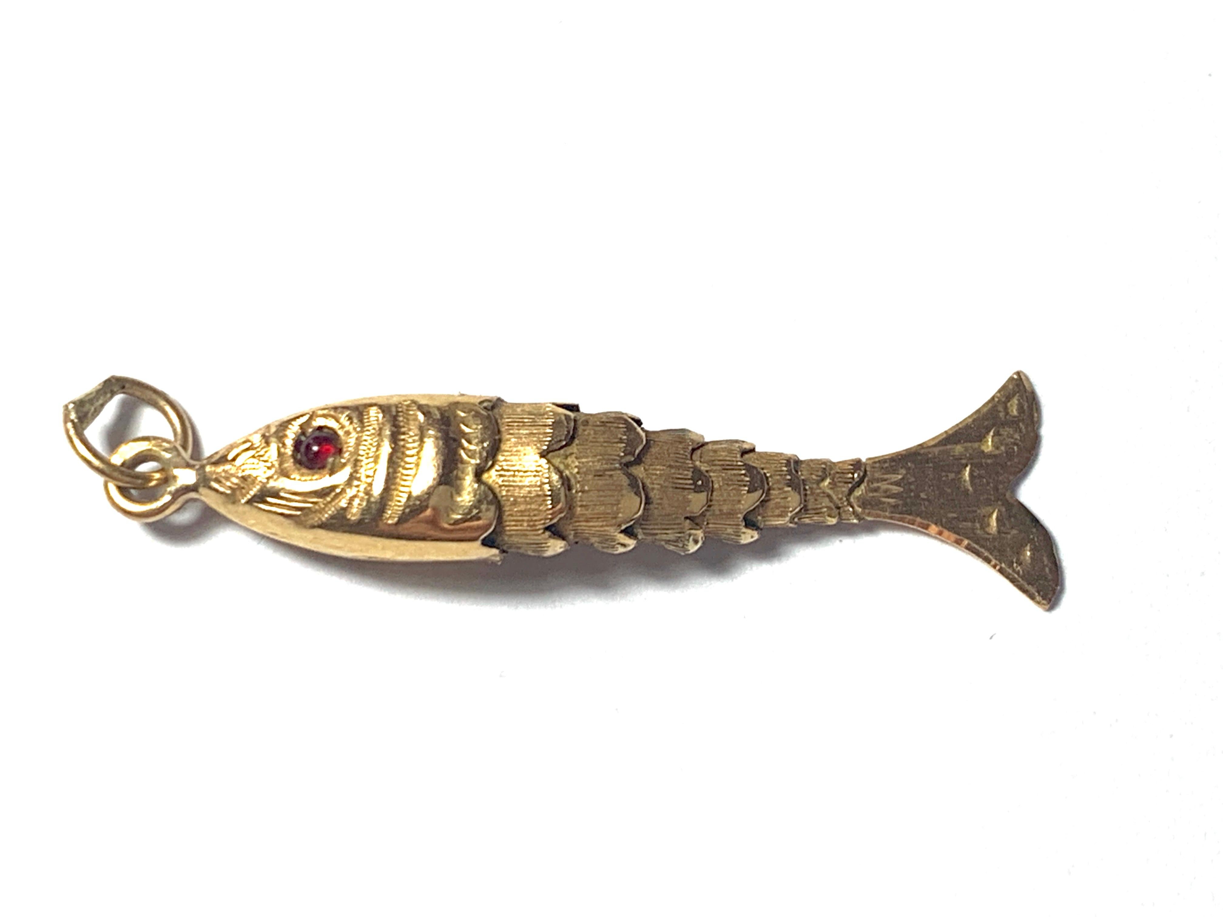 14k gold articulated fish pendant