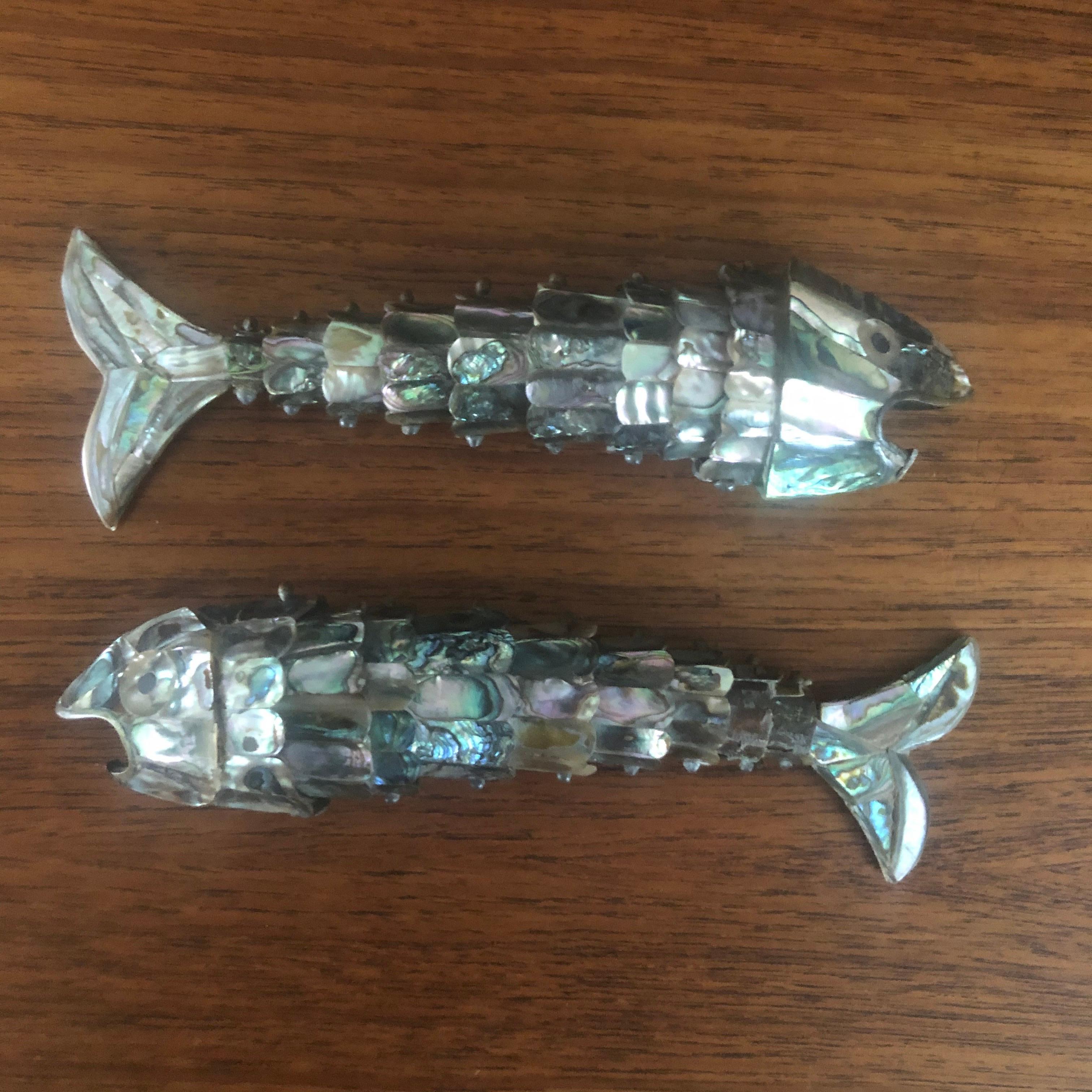 Vintage articulated abalone shell fish sculpture / bottle opener by Los Castillo Taco, Mexico, circa 1960s. The piece is well detailed and patinated.

There are two pieces available. They are in good vintage condition; the are some small pieces of