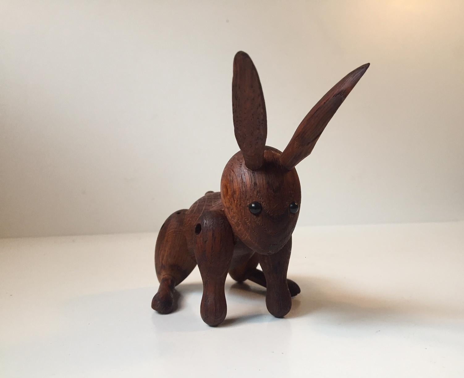 Vintage rabbit figurine or toy by Kay Bojesen. It was designed in 1957. This is an example from the 1960s fashioned out of oak. It has a rich and dark patina.