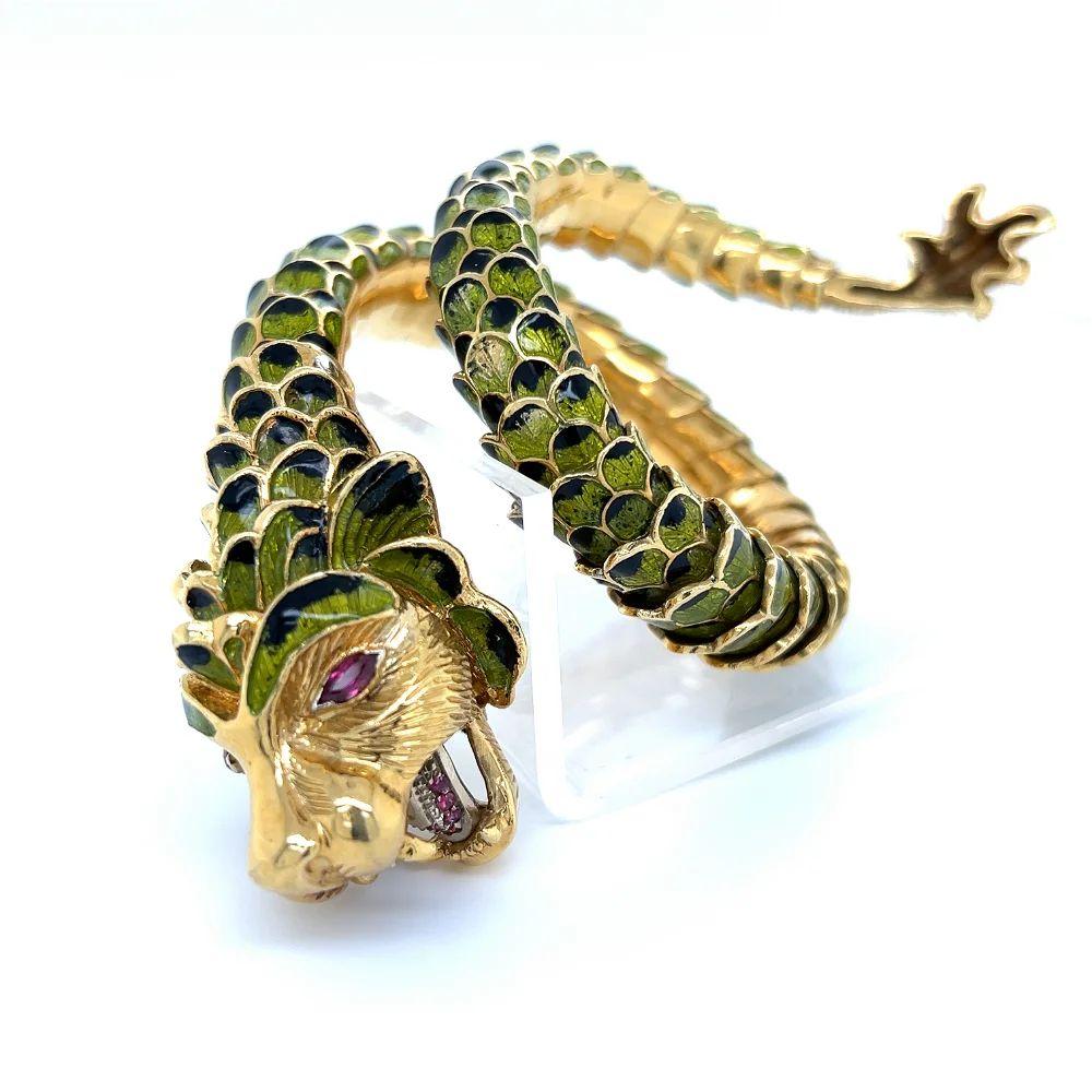 Simply Fabulous! Vintage One-of-a-Kind Articulating Dragon Serpent Enamel Gold Wrap Cuff Bracelet. Wildly unique! Crafted by skilled artisans, featuring an articulating design with Hand set Rubies, weighing approx.  0.40tcw. The wrap around Enameled