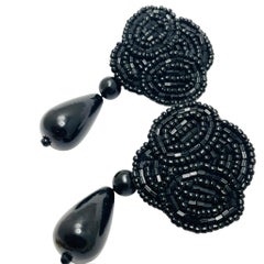 Vintage artisan black dangle clip on earrings