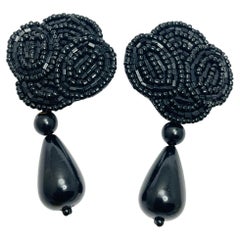 Vintage artisan black dangle clip on earrings