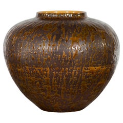 Vieille jarre en céramique bicolore à glaçure aux tons caramel de la collection Artisan Prem