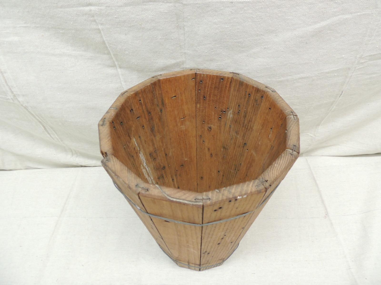 Vintage artisanal wood and wire barrel style wastebasket.
Size: 10