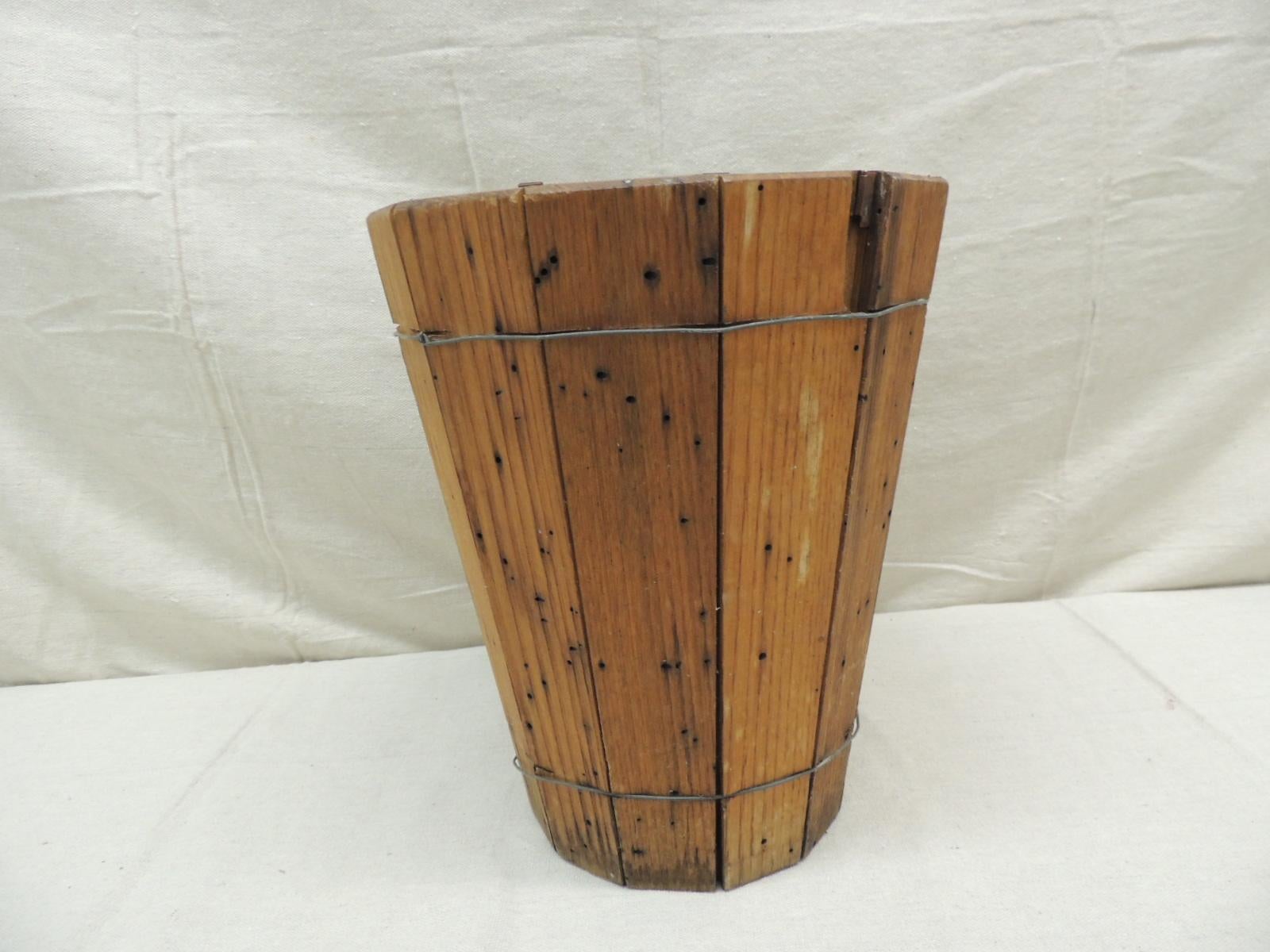 wooden barrel trash can