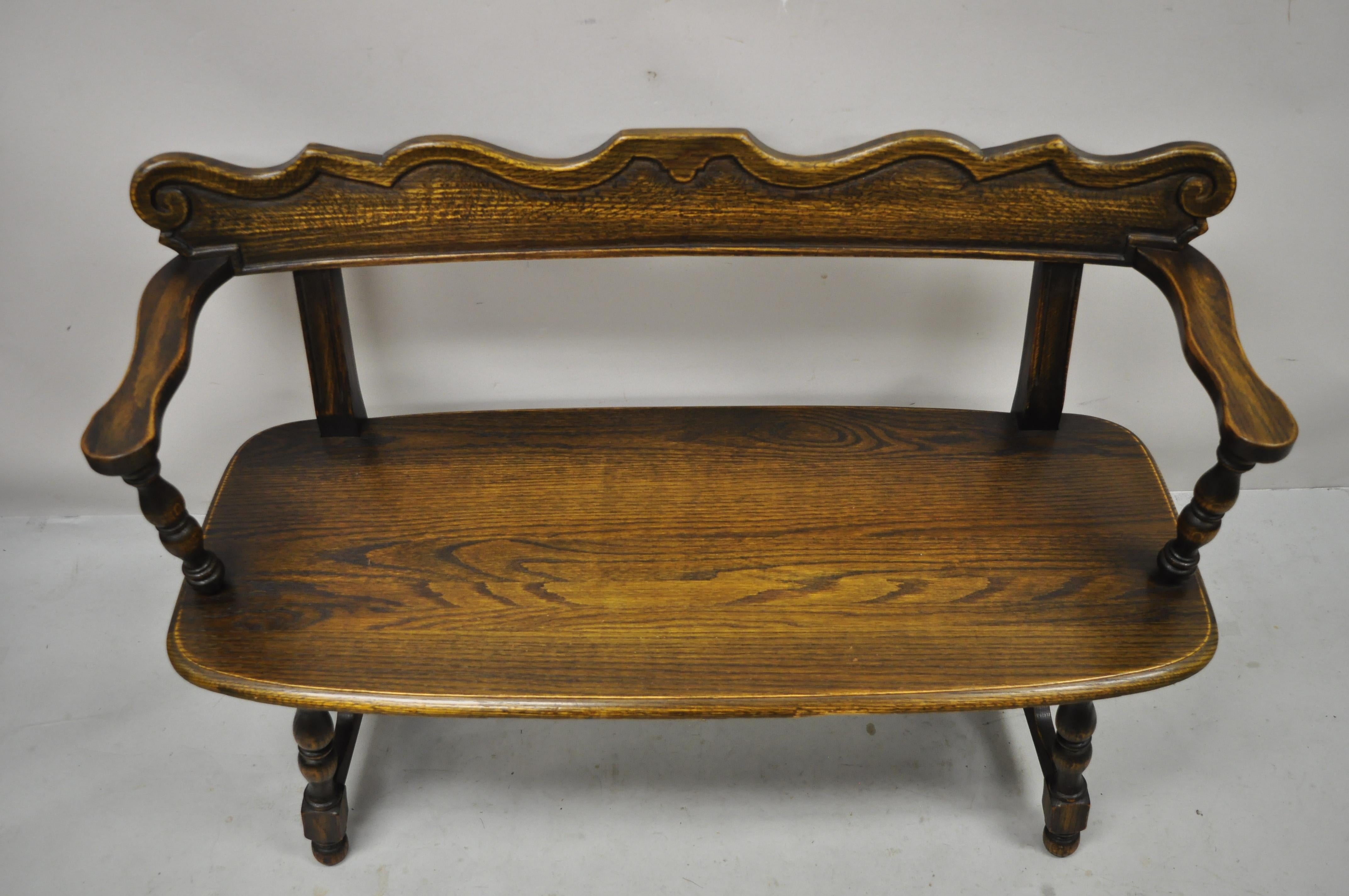 Arts & Crafts Jamestown lounge Feudal bench, Romweber Viking oak style. Item features believed to be Feudal Oak Collection by Jamestown, solid wood construction, beautiful wood grain, nicely carved details, very nice vintage item, quality American