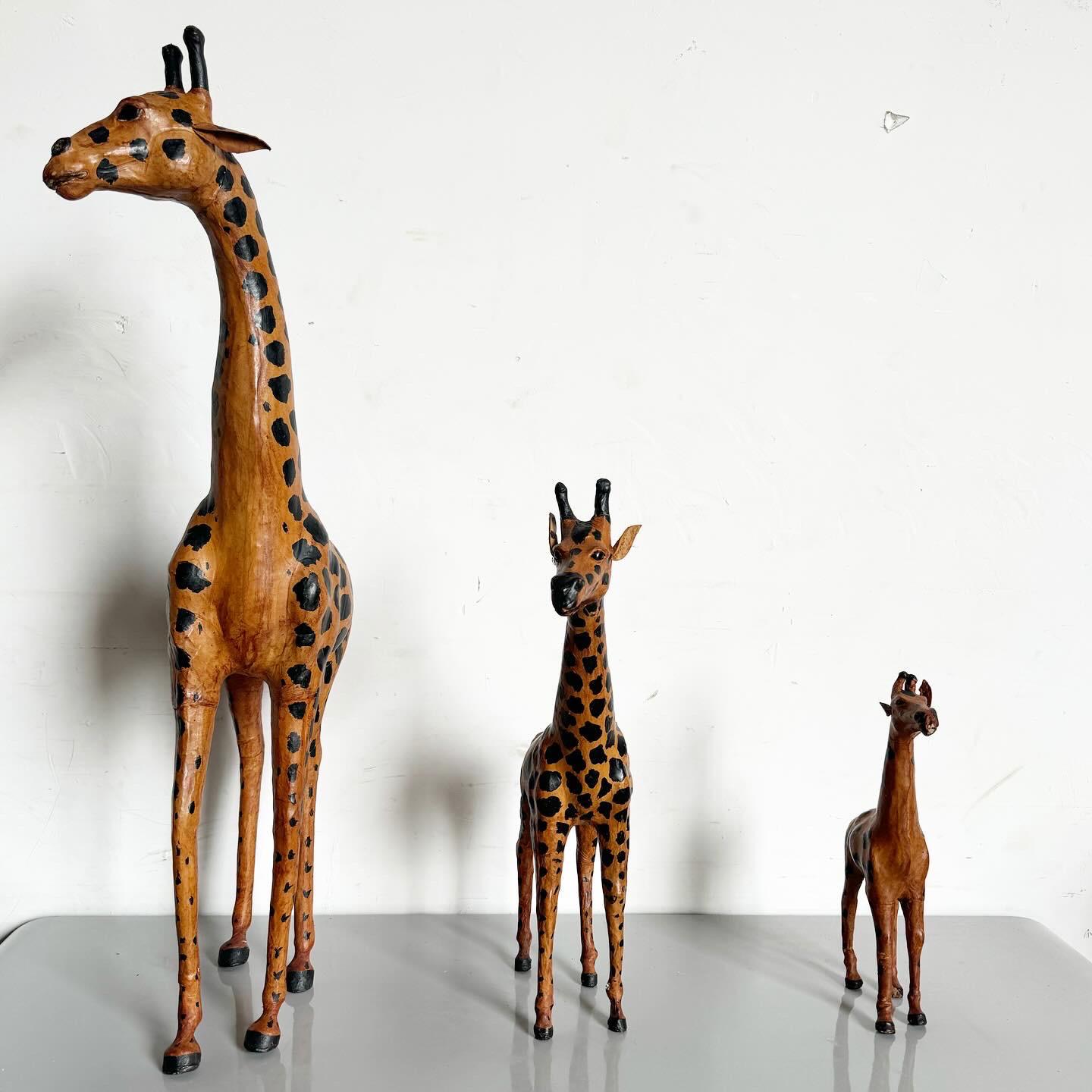 Vintage Ascending Leather Wrapped Giraffe Sculptures - Set of 3 In Good Condition For Sale In Delray Beach, FL