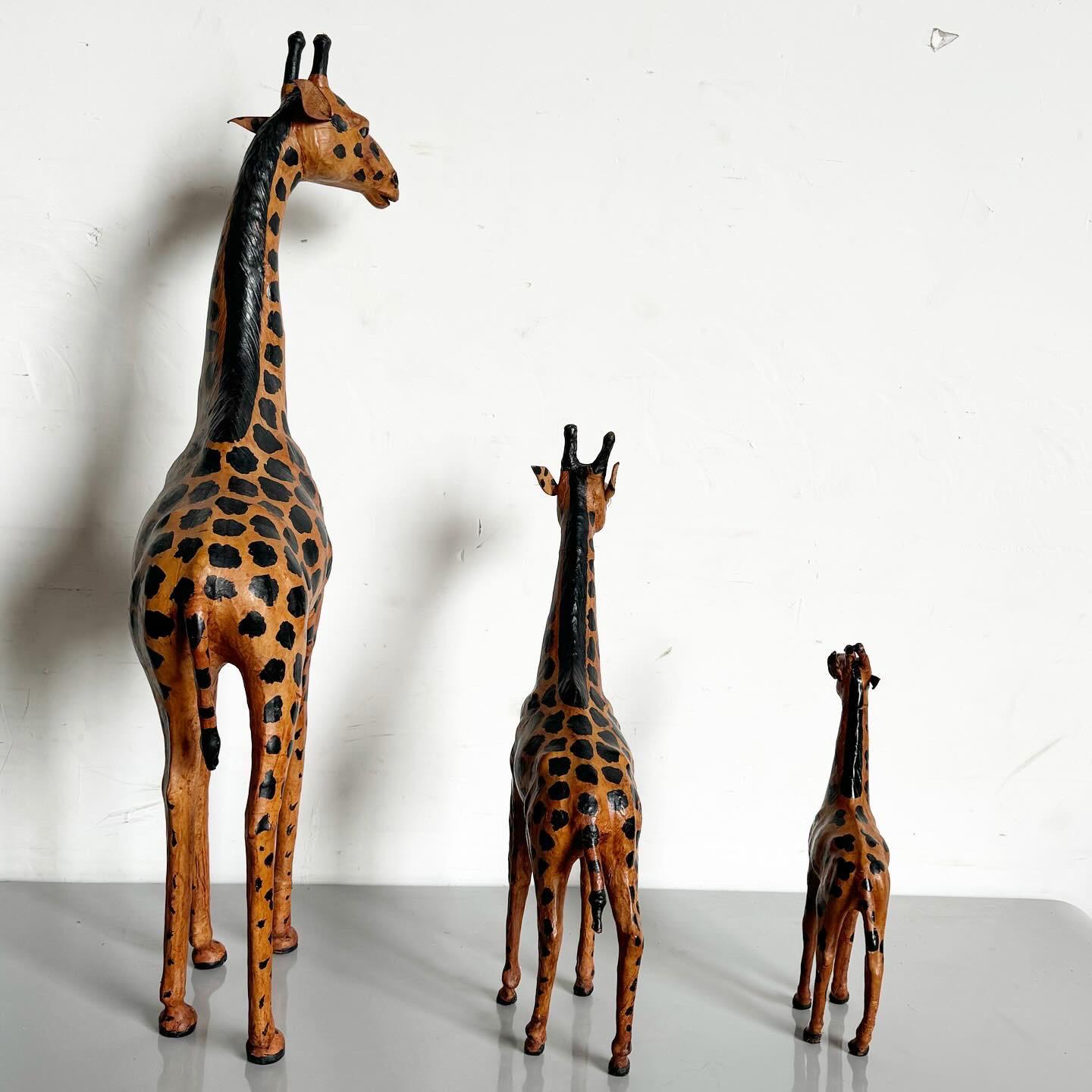 20th Century Vintage Ascending Leather Wrapped Giraffe Sculptures - Set of 3 For Sale