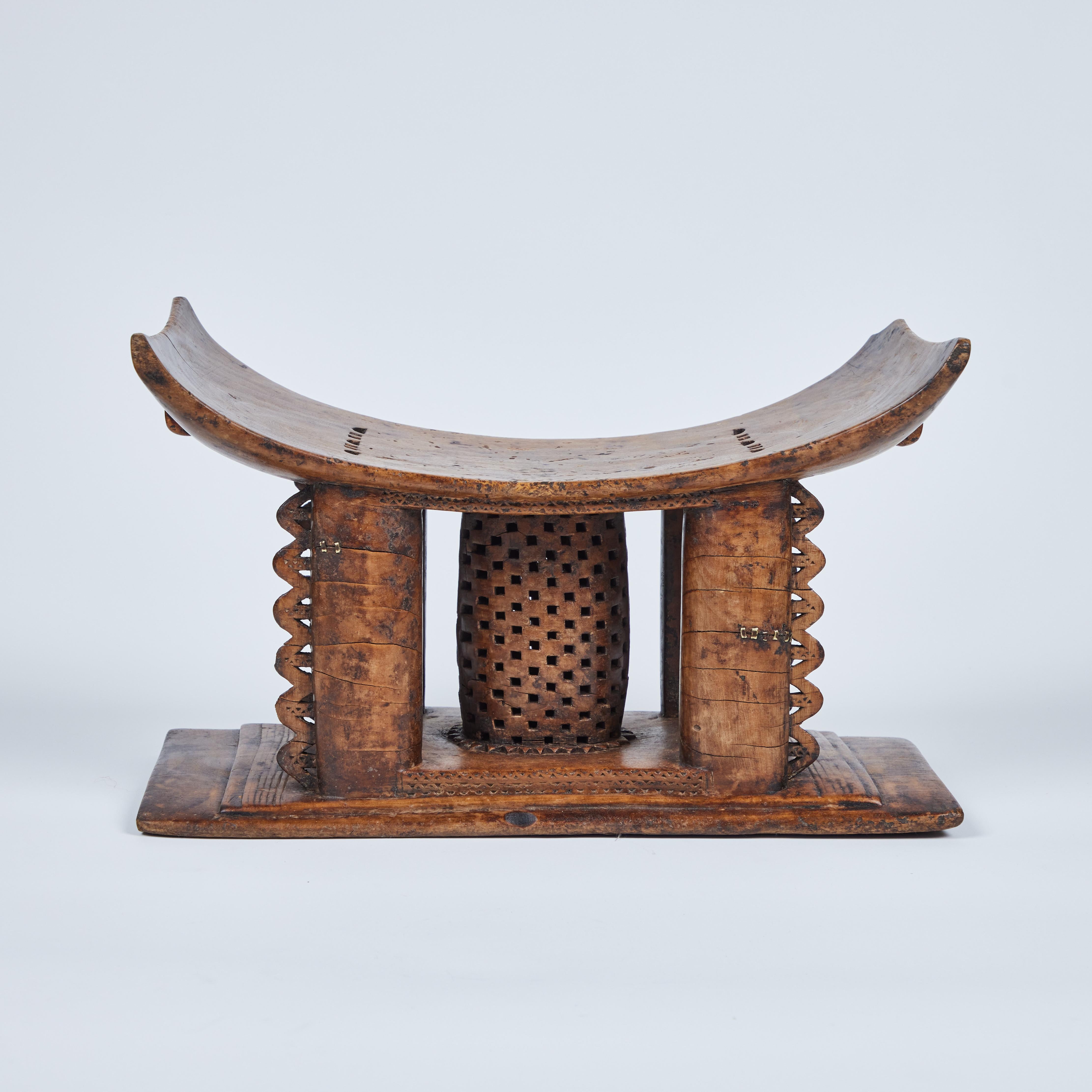 Stools were carved from a single piece of wood, with different designs and meanings. They were given as gifts on marriage and passed from father to son.

According to legend the Asante empire of Akan-speaking people on the Gold Coast, West Africa,