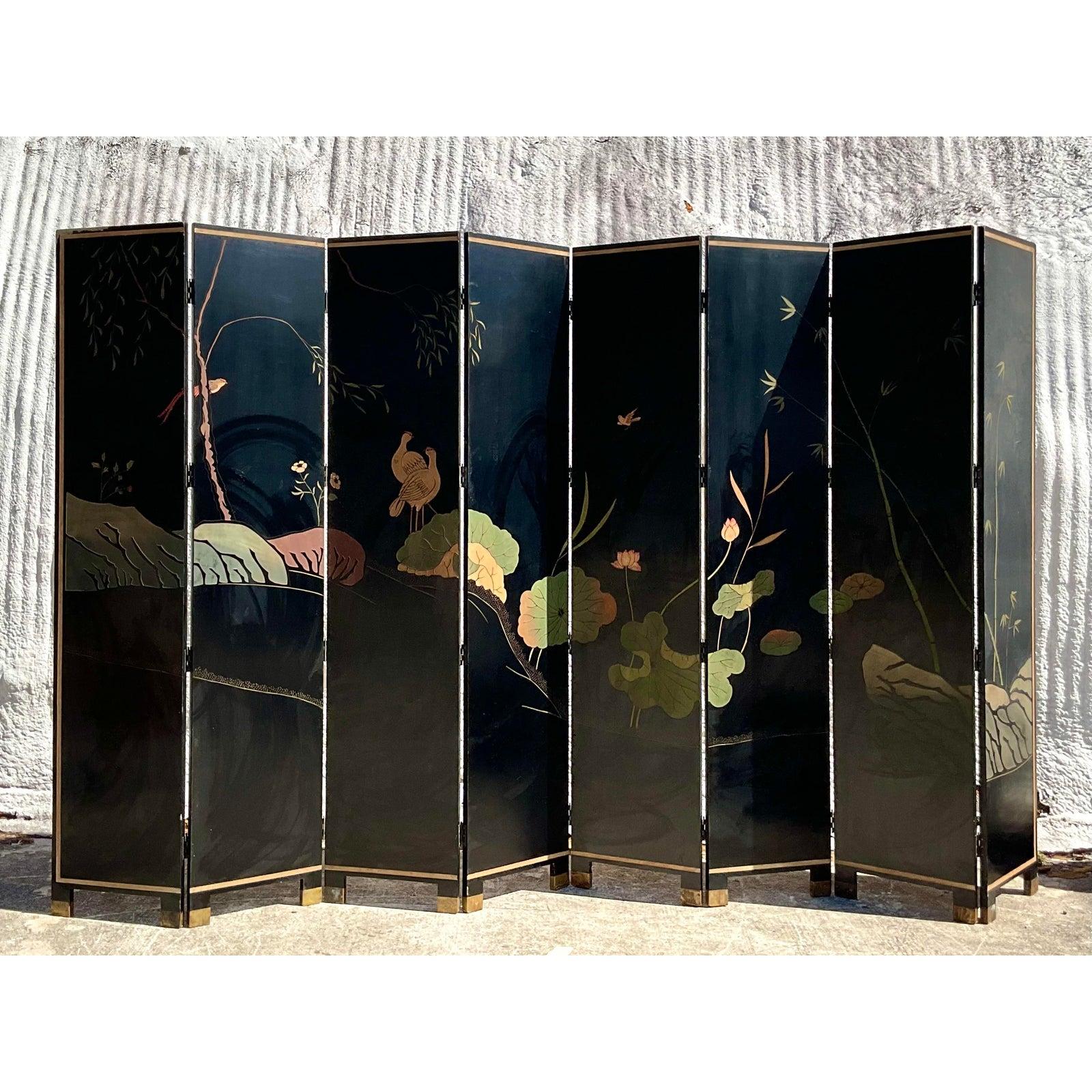 Spectacular vintage Asian golden Coromandel Screen. Stunning 8 panel piece with a composition of flora and fauna. Really striking. Beautiful on both sides. Acquired from a Palm Beach estate.