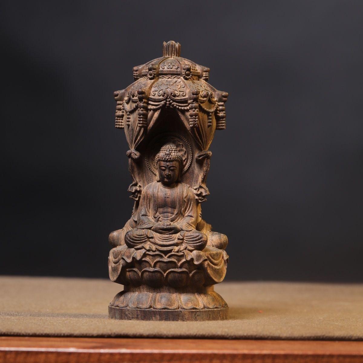 This Vintage Asian Agarwood Carving beautifully depicts the revered Western Pure Land Three Holy Figures: Amitabha Buddha, Avalokiteshvara (Guanyin), and Mahasthamaprapta. Skillfully hand-carved from fragrant, high-quality agarwood, these statues