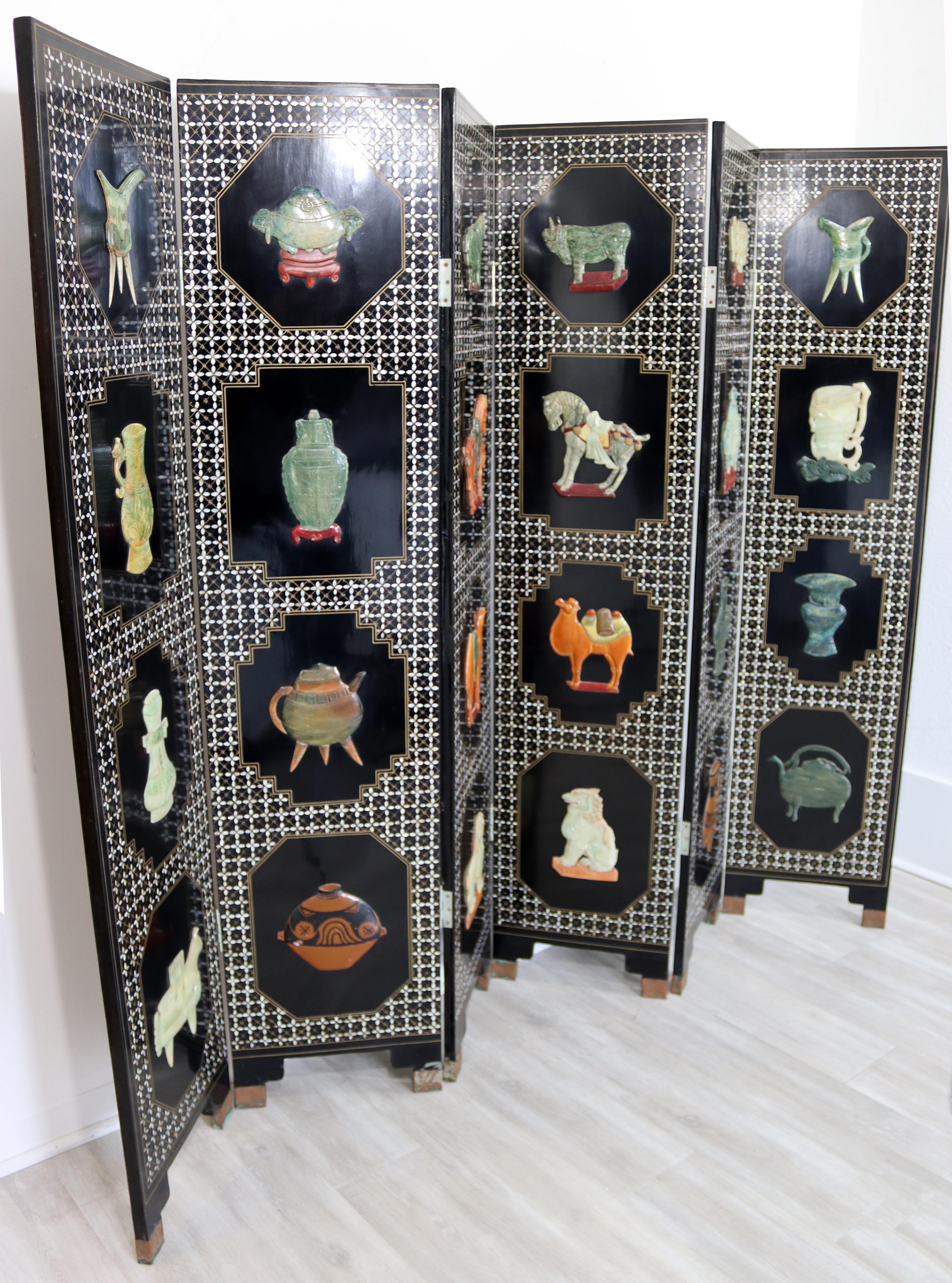 For your consideration is a phenomenal, Asian, six panel, free standing room divider screen featuring jade carved motifs and mother of pearl inlay. In good vintage condition, with some crazing and minor chips were the panels folds. The dimensions