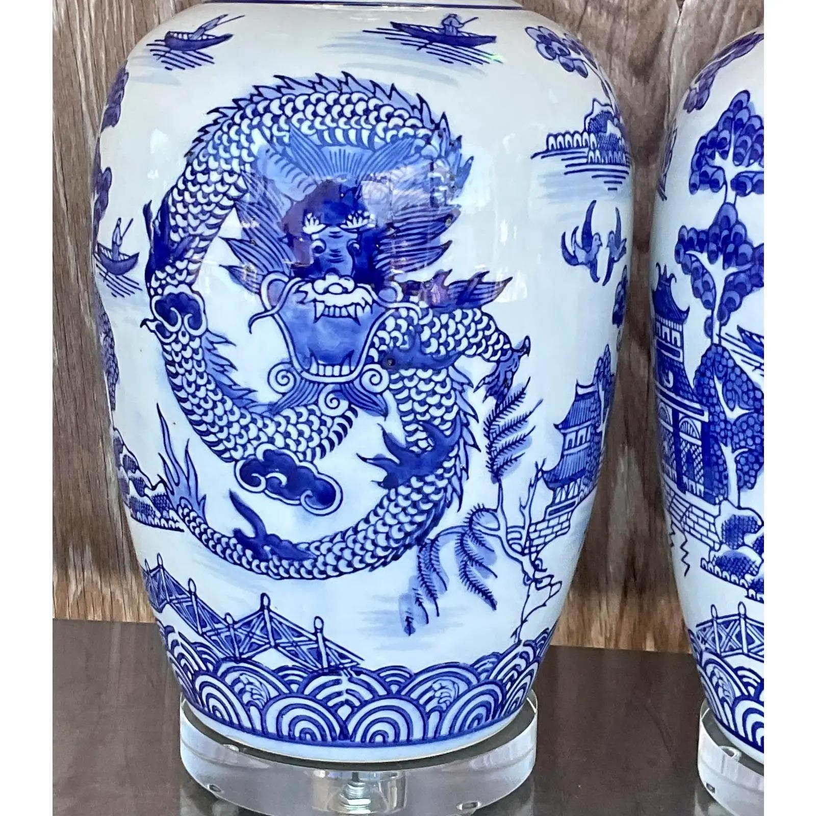 Vintage Asian Blue and White Dragon Ceramic Lamps, a Pair In Good Condition In west palm beach, FL