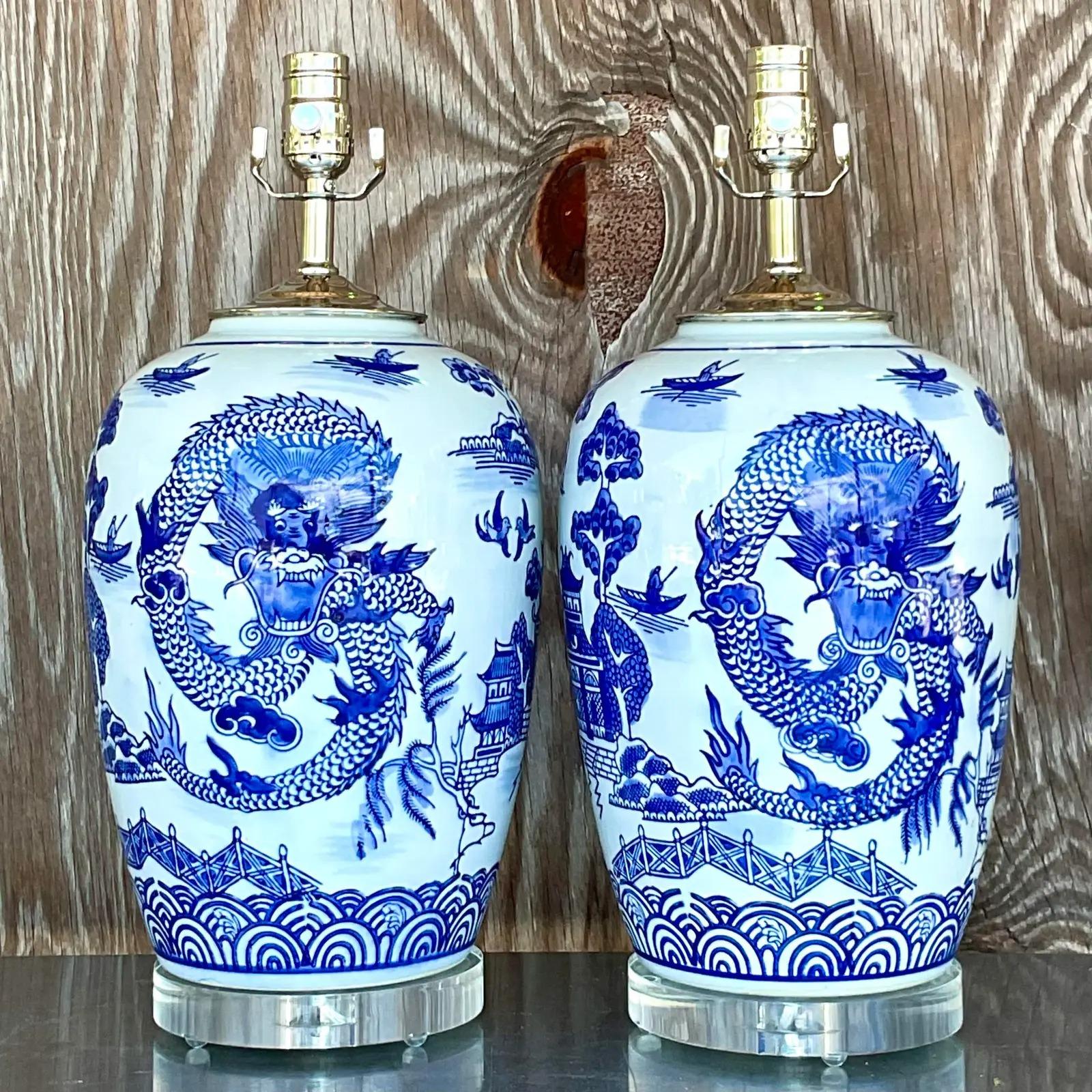 20th Century Vintage Asian Blue and White Dragon Ceramic Lamps, a Pair