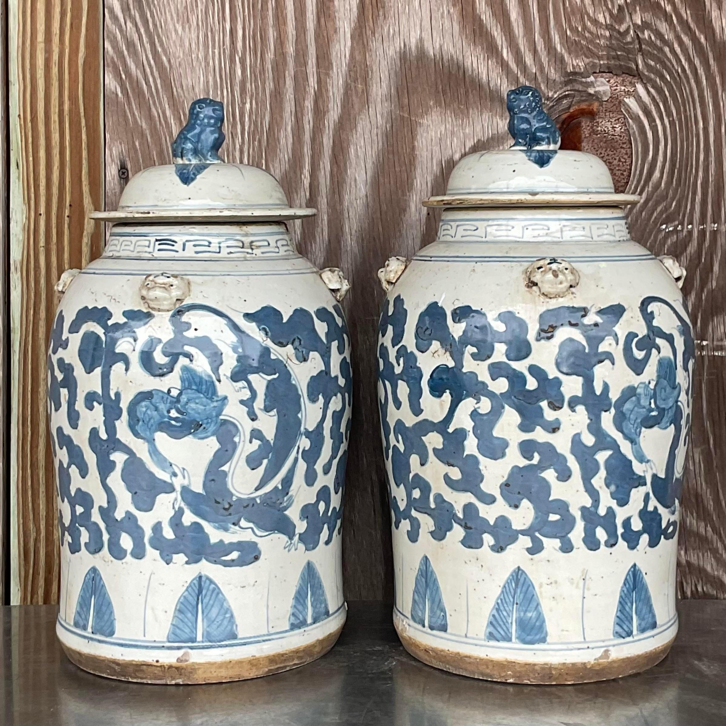Vintage Asian Blue and White Foo Dog Urns - a Pair In Good Condition For Sale In west palm beach, FL