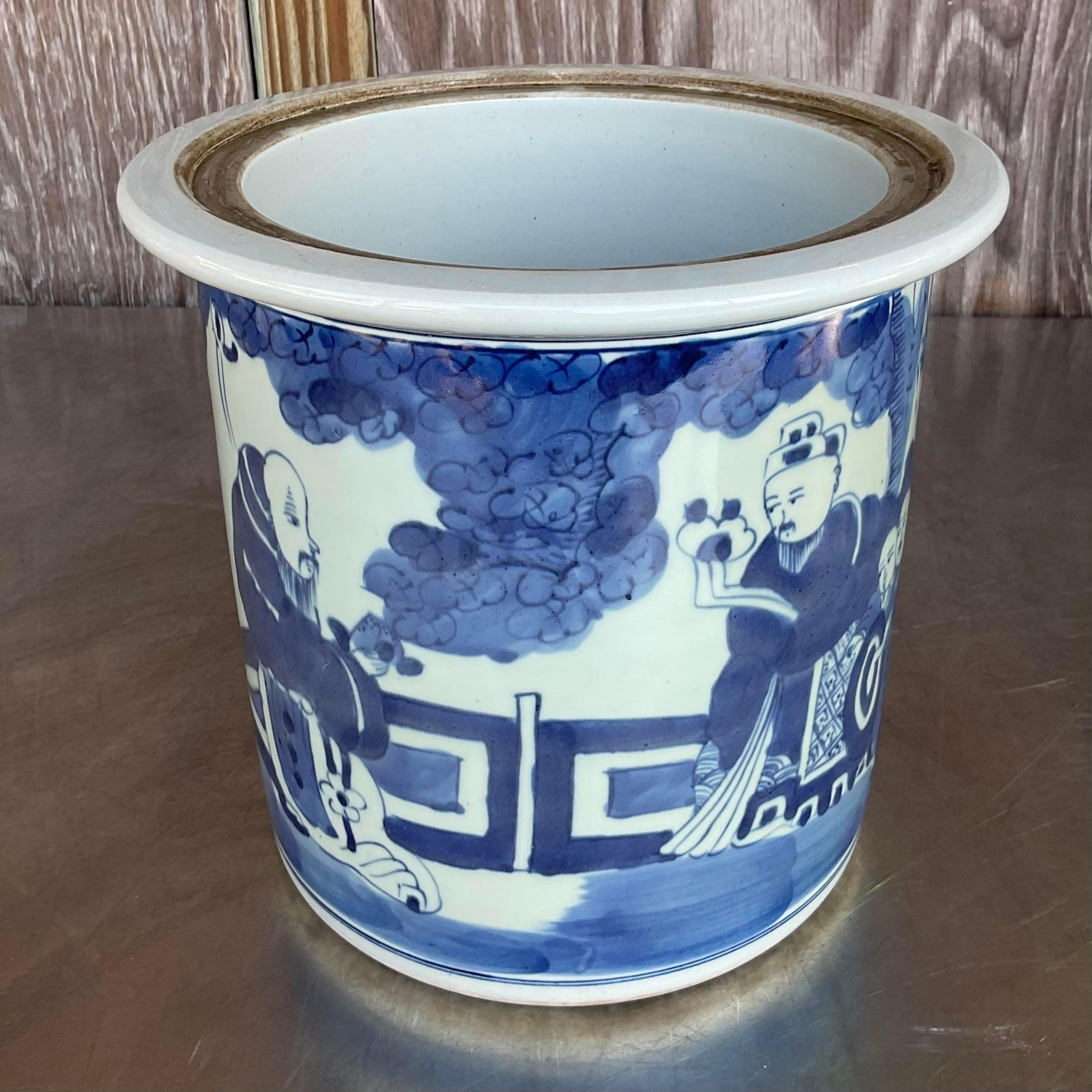 Add a touch of timeless elegance with our Vintage Asian Blue and White Lidded Jar. This exquisite piece showcases traditional Asian craftsmanship, featuring intricate blue and white designs. A classic addition that effortlessly complements American