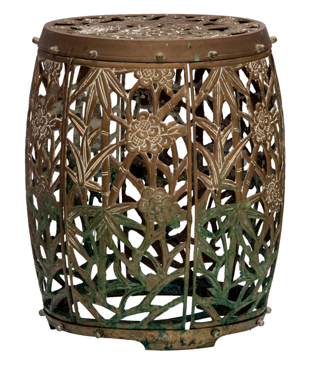 Stunning, solid brass garden stool/ drum table showcases a unique pierced design with meticulous attention to detail. It's sturdy construction insurance durability, allowing it to withstand the elements for outdoor use, while also complementing
