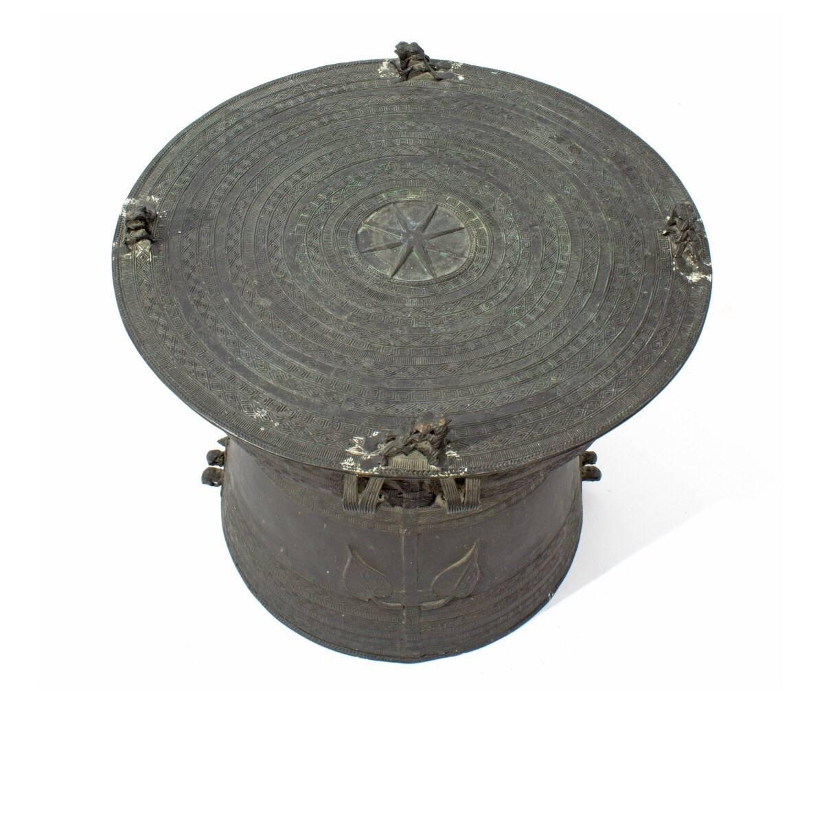 Vintage Asian bronze rain drum table. Ideal as an accent table or tall coffee table. May be used outdoors in a covered area. Measures: 20 inches wide x 15.5 inches high.