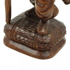 Vintage Asian Carved Figure of a Man with Pack and Walking Stick