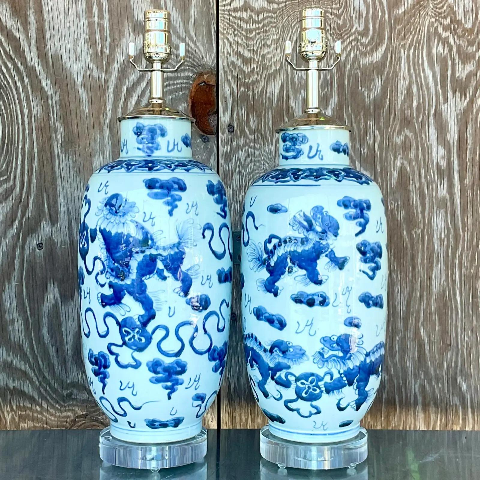 Vintage Asian Chinese Porcelain Foo Dog Lamps, a Pair In Good Condition In west palm beach, FL