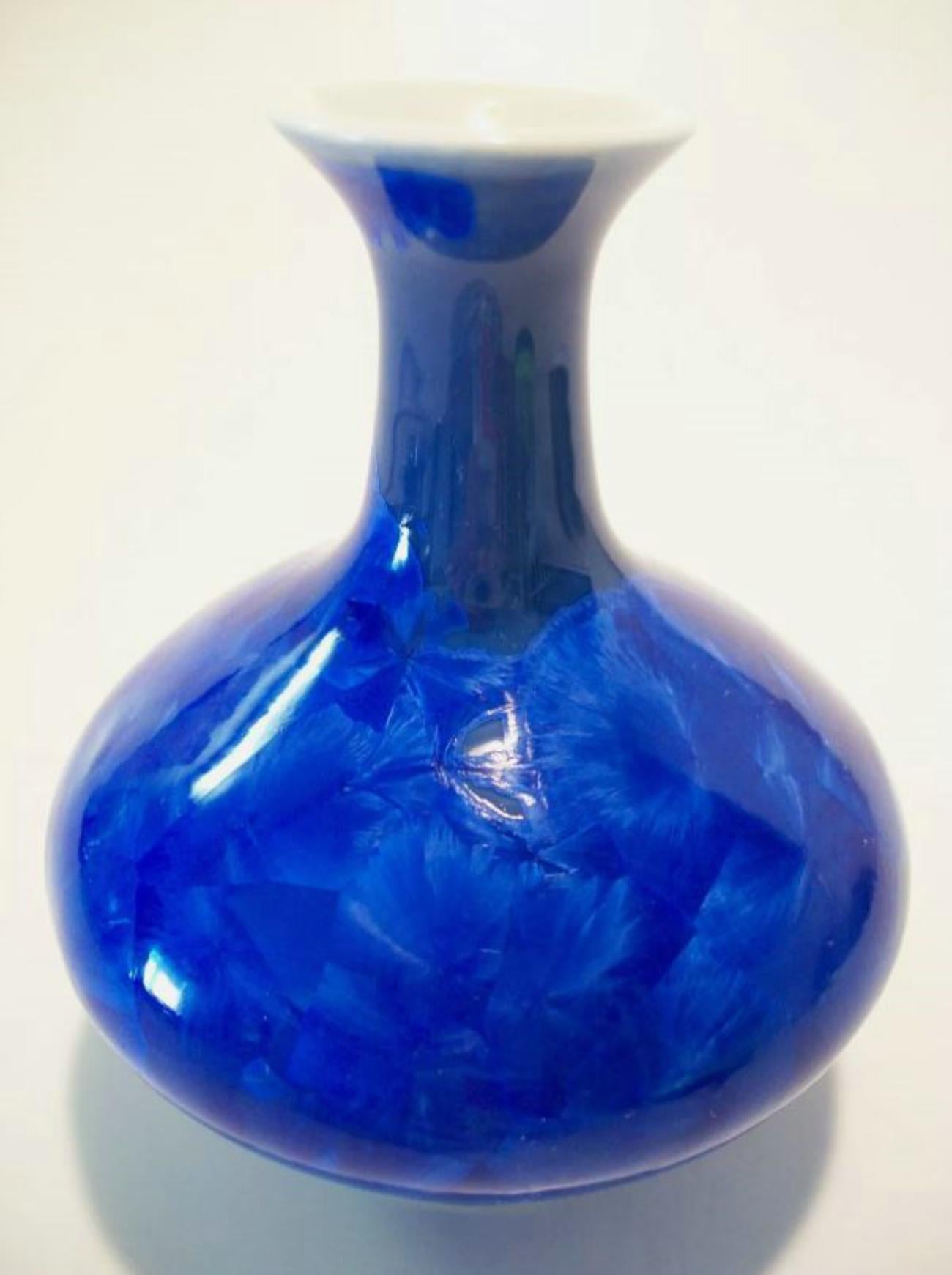 Vintage Asian porcelain vase with royal blue crystalline glaze - white interior - four character mark on the base - mid 20th century.

Excellent vintage condition - no loss - no damage - no restoration - minimal signs of age and use.

Size - 3 3/8