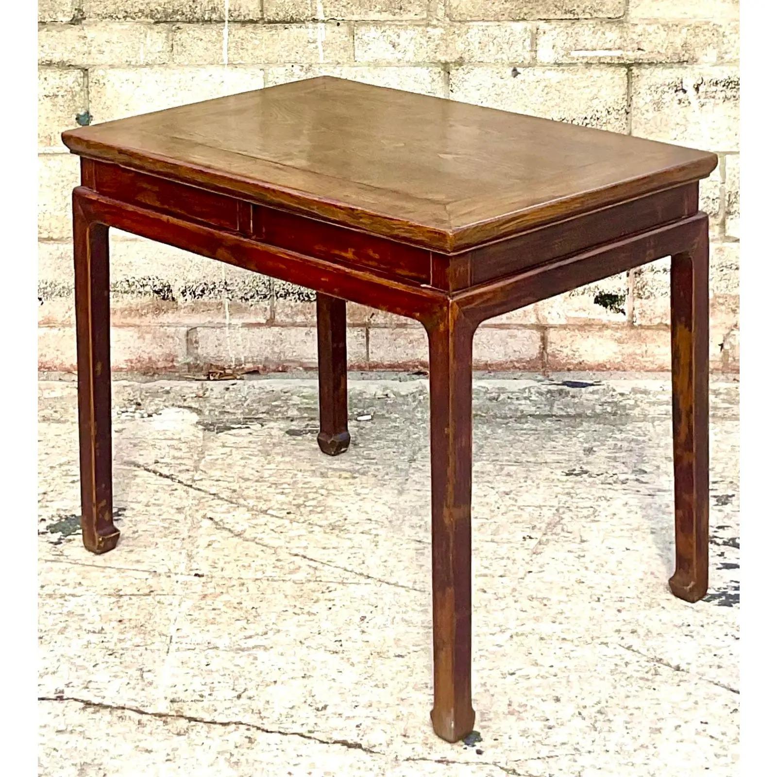 Incredible vintage Asian writing desk. Custom built to the designers specs. Beautiful reclaimed wood finish in warm reddish brown. Hidden drawers that open from below. Just so chic. Acquired from a Palm Beach estate.