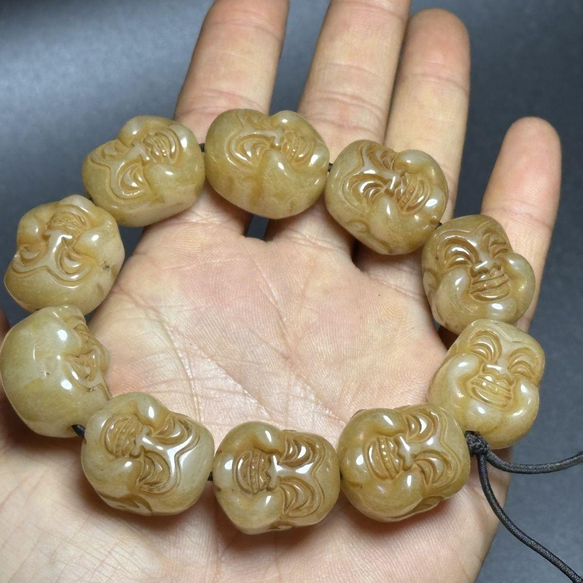 Vintage Asian Jade Maitreya Buddha Head Beads Bracelet – Hand-Carved Spiritual Jewelry

Elevate your style and spirit with this exquisite Vintage Asian Jade Bracelet, featuring intricately hand-carved Maitreya Buddha head beads. Crafted from genuine