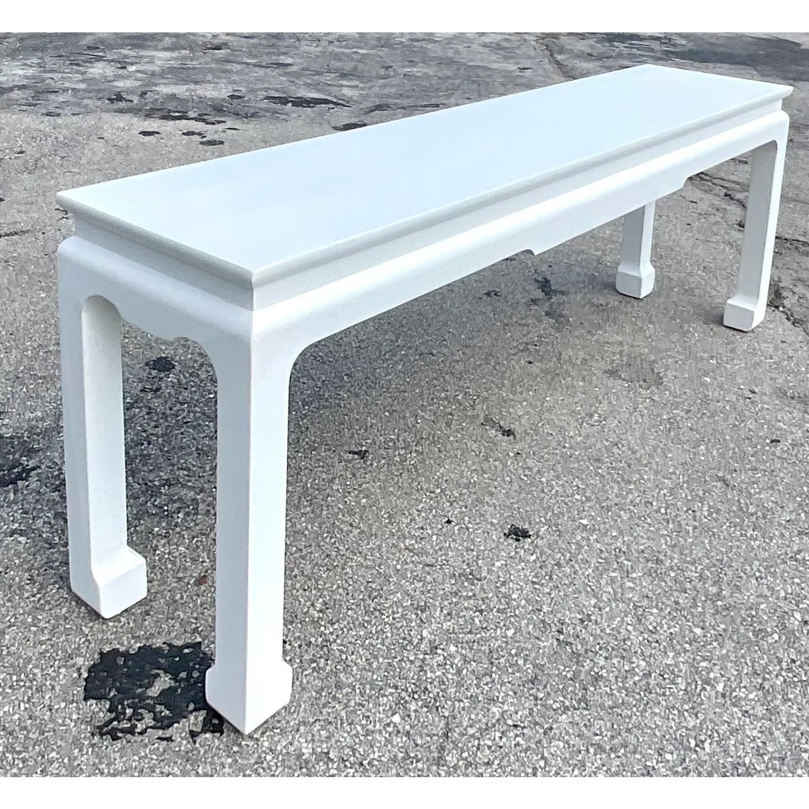 Fantastic vintage Asian Console table. A chic Ming design in a bright white finish. Acquired from a Palm Beach estate.