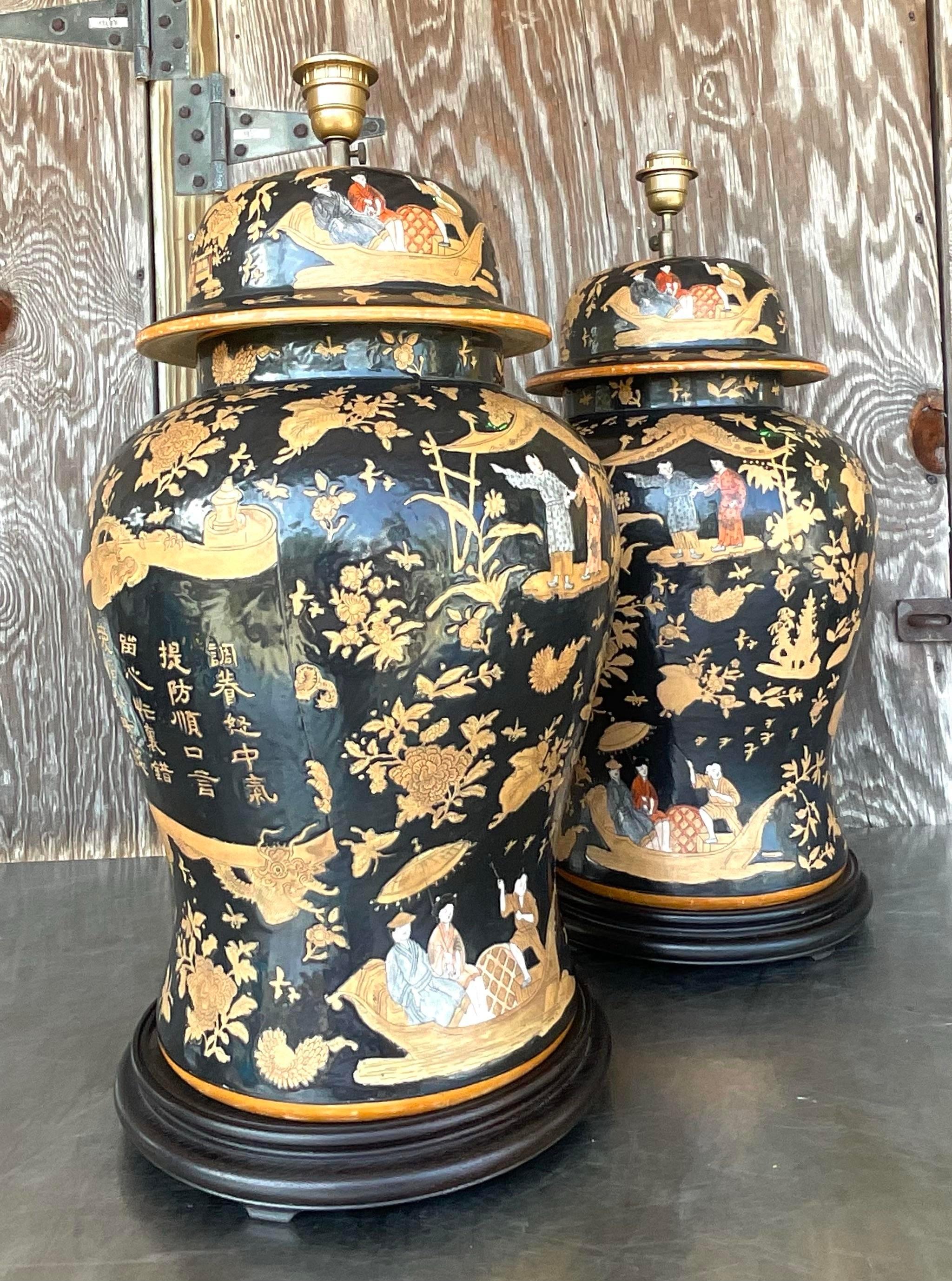 Immerse your space in the timeless allure of the East with our Vintage Asian Monumental Chinoiserie Ginger Jar Lamps - A Pair. Crafted with meticulous detail, these lamps exude elegance and sophistication, seamlessly blending Eastern artistry with