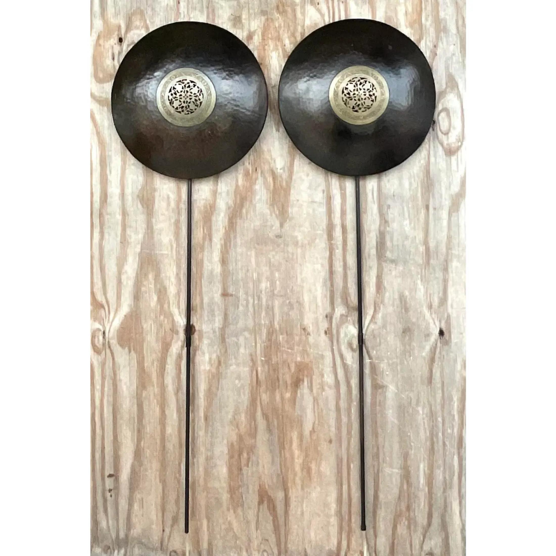 Vintage Asian Patinated Brass Medallion Sconces - a Pair In Good Condition For Sale In west palm beach, FL