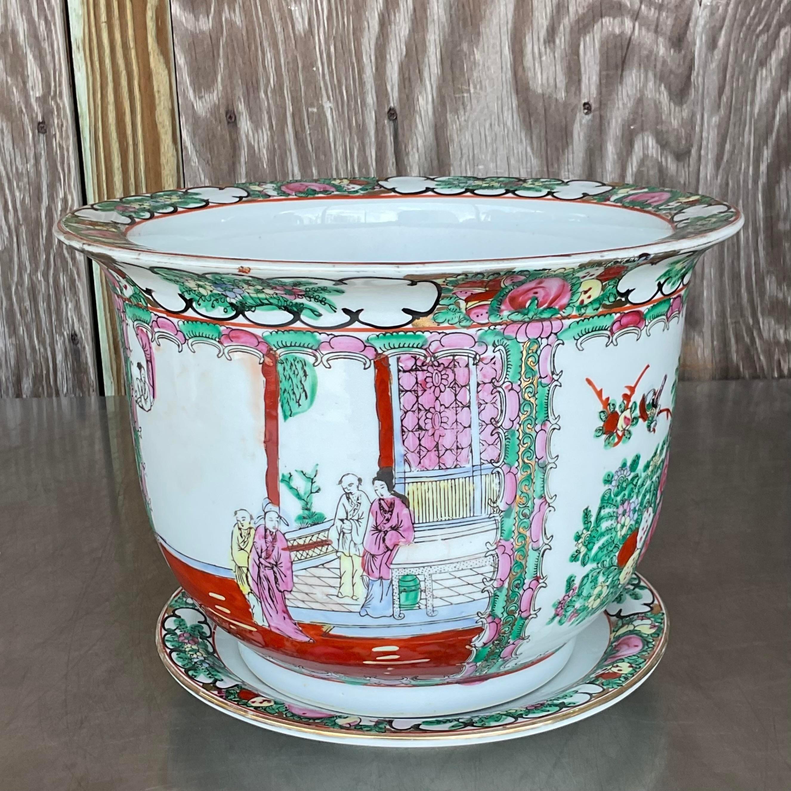 Elevate your indoor garden with the Vintage Asian Rose Famile Planter and Saucer, marrying Eastern elegance with American flair. Crafted with intricate rose motifs, this piece adds a touch of timeless sophistication to any botanical display