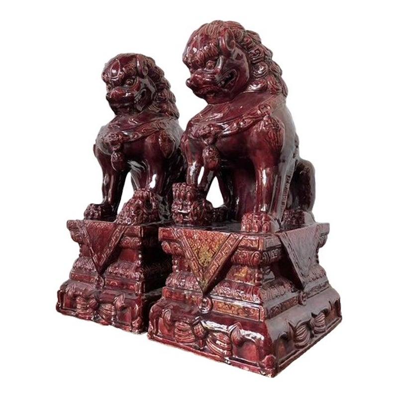Lions Foo asiatiques vintage "Sang de Bouf" - une paire